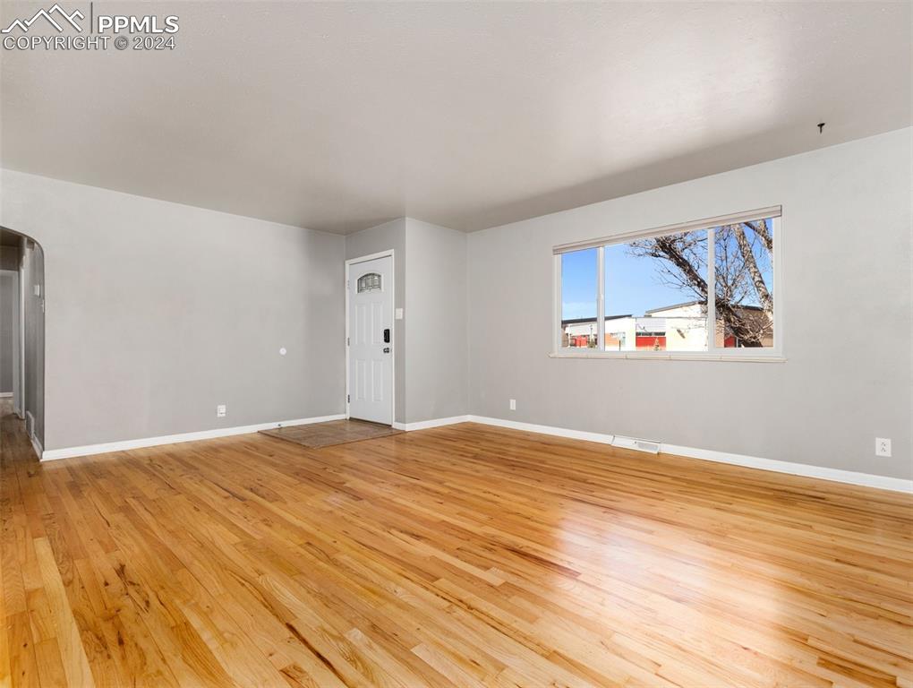 65 University Circle Pueblo, CO 81005 - Photo 10 of 32 a view of empty room with wooden floor