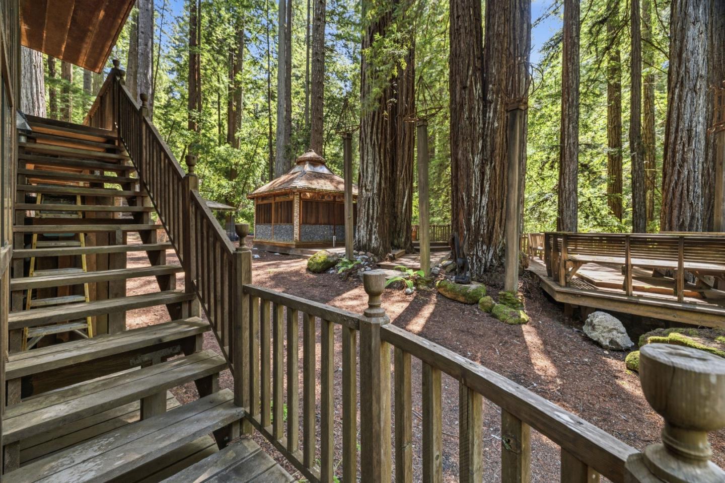 41 Back Road La Honda, CA 94020 - Photo 52 of 101 a view of a wooden deck and a backyard
