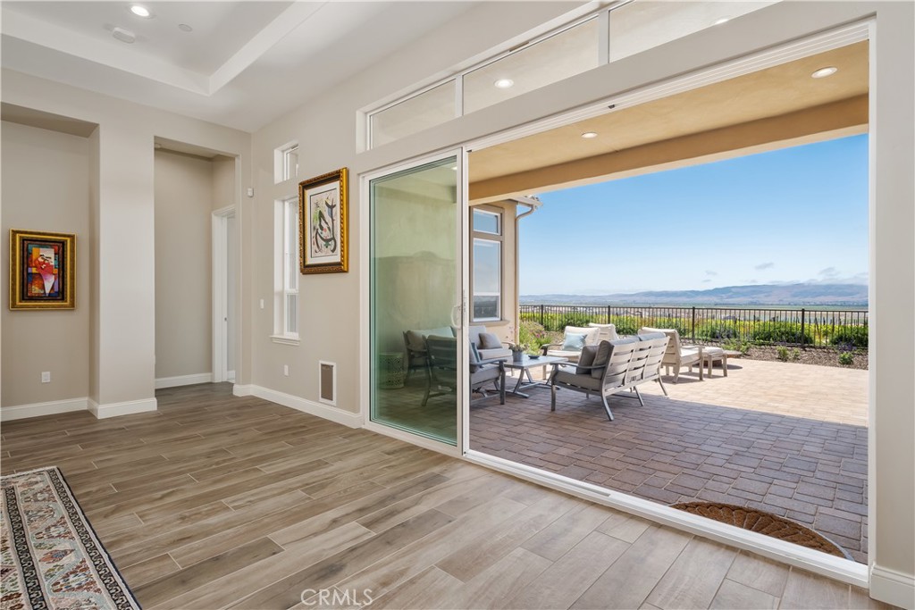 1630 Eucalyptus Road Nipomo, CA 93444 - Photo 14 of 75 a view of a living room and a floor to ceiling window