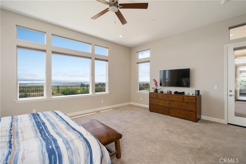 1630 Eucalyptus Road Nipomo, CA 93444 - Photo 30 of 75 a living room with furniture and a flat screen tv
