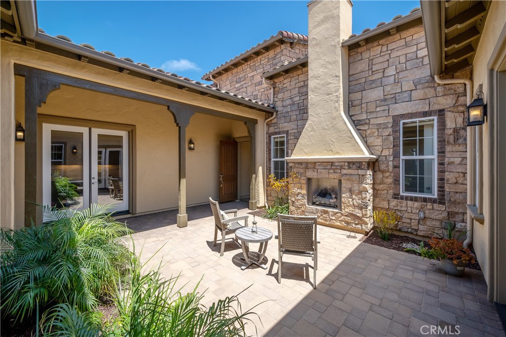 1630 Eucalyptus Road Nipomo, CA 93444 - Photo 38 of 75 a view of a dinning table and chairs in patio of the house