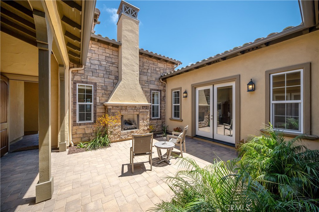 1630 Eucalyptus Road Nipomo, CA 93444 - Photo 39 of 75 a building outdoor space with patio furniture and potted plants