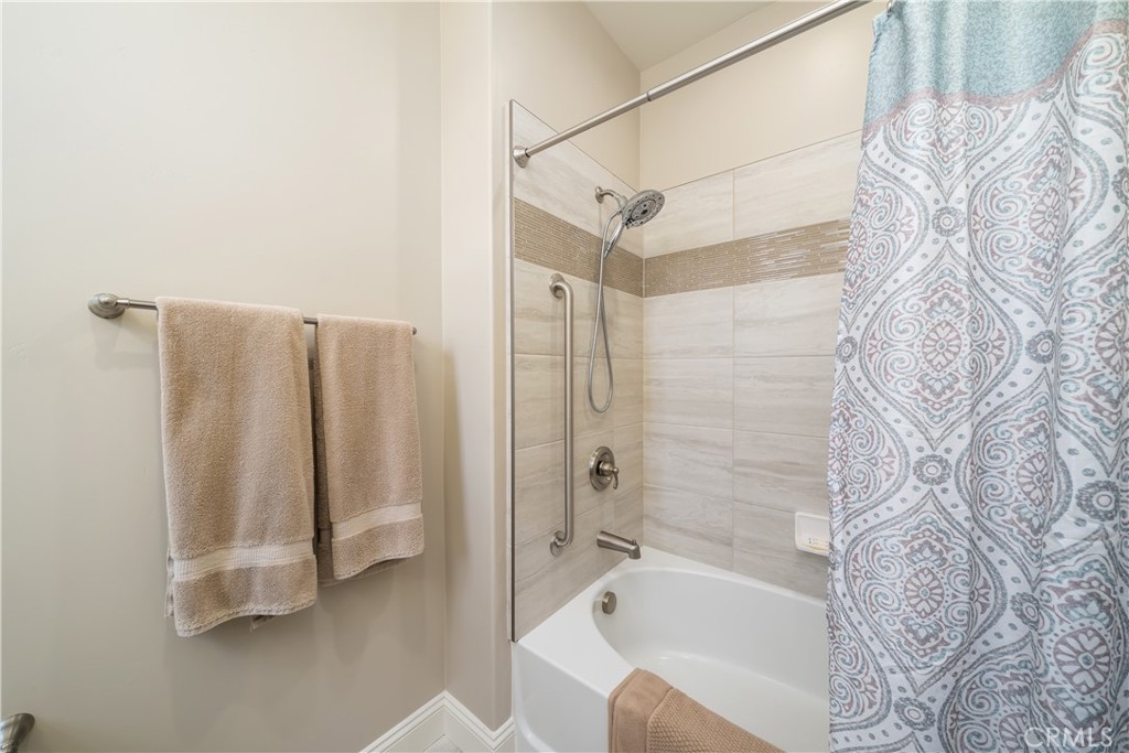 1630 Eucalyptus Road Nipomo, CA 93444 - Photo 46 of 75 a bathroom with a bathtub and shower