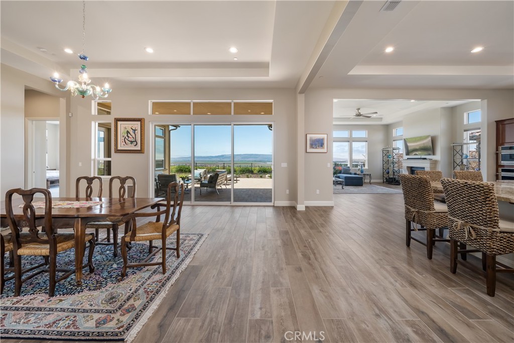 1630 Eucalyptus Road Nipomo, CA 93444 - Photo 6 of 75 a view of a a dining room with furniture window and wooden floor