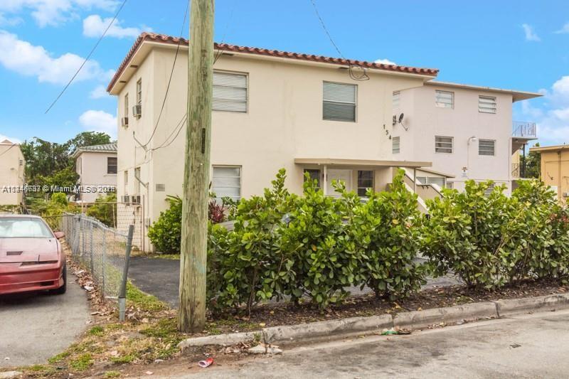 154 Southwest 18th Court Miami, FL 33135 - Photo 4 of 9 a view of multiple house with a street