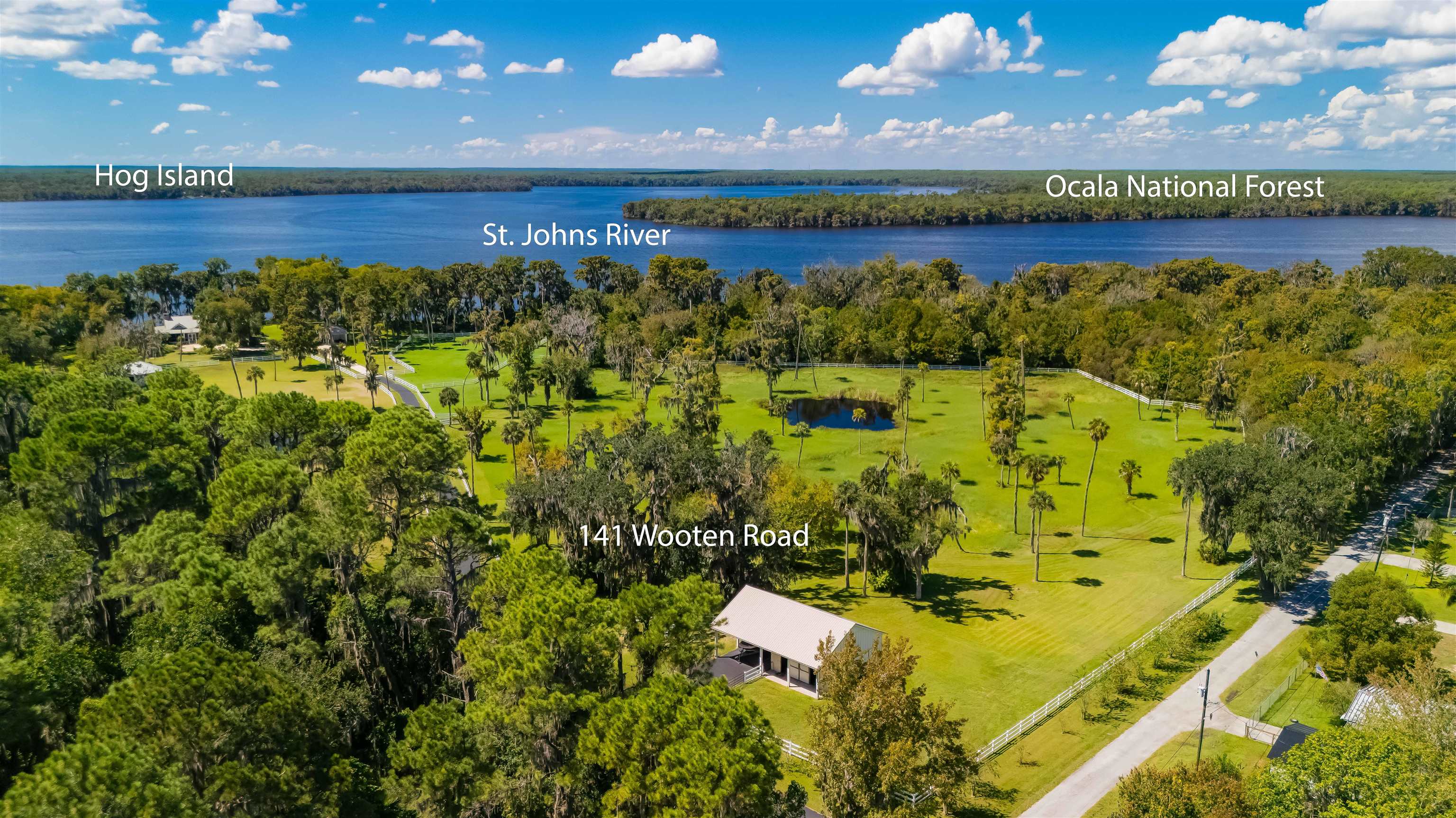141 Wooten Rd Crescent Crescent City, FL 32112 - Photo 11 of 72 an aerial view of a residential houses with outdoor space swimming pool and an outdoor space