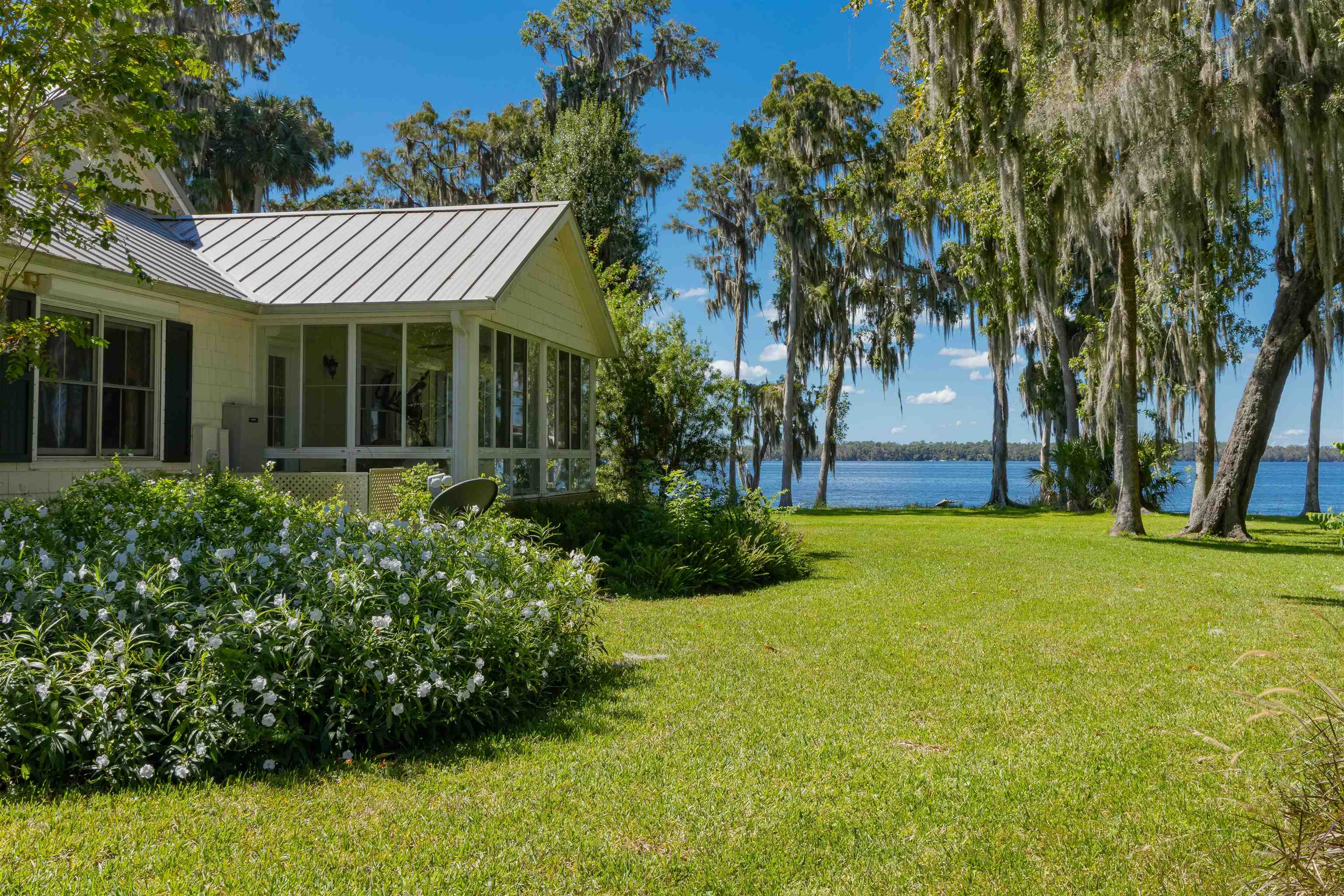 141 Wooten Rd Crescent Crescent City, FL 32112 - Photo 22 of 72 front view of a house with a yard