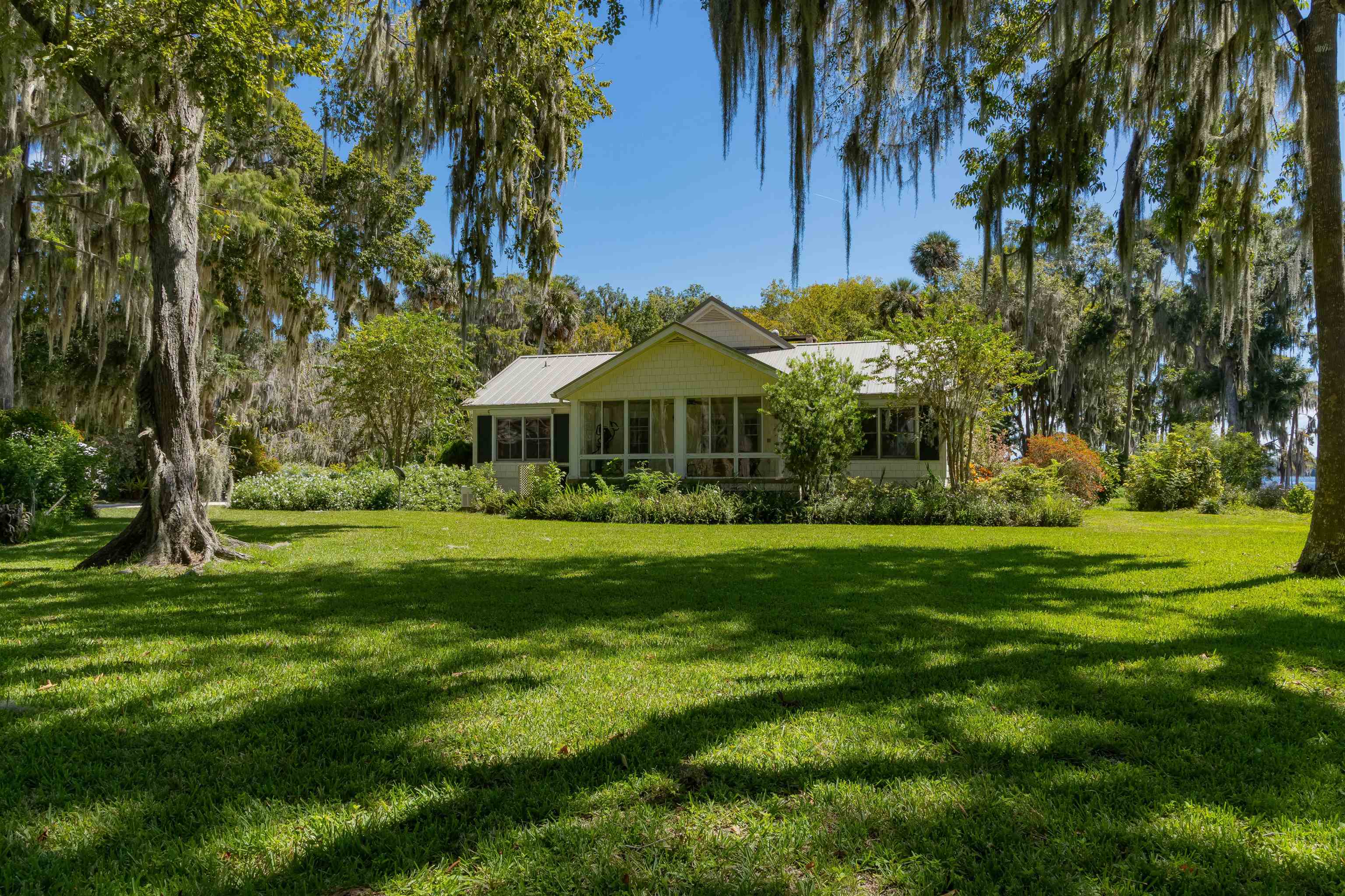 141 Wooten Rd Crescent Crescent City, FL 32112 - Photo 36 of 72 a view of a house with a big yard