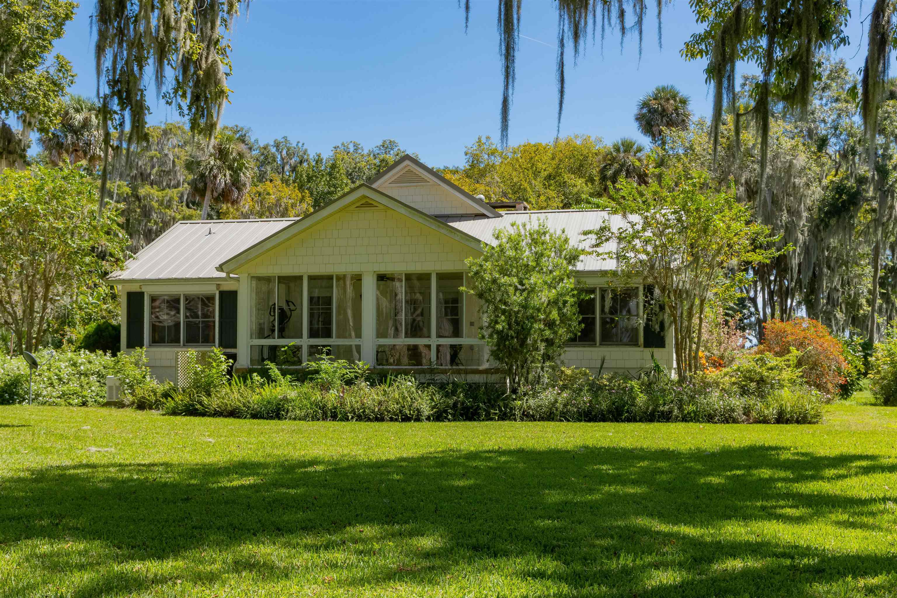 141 Wooten Rd Crescent Crescent City, FL 32112 - Photo 38 of 72 a view of a house with garden