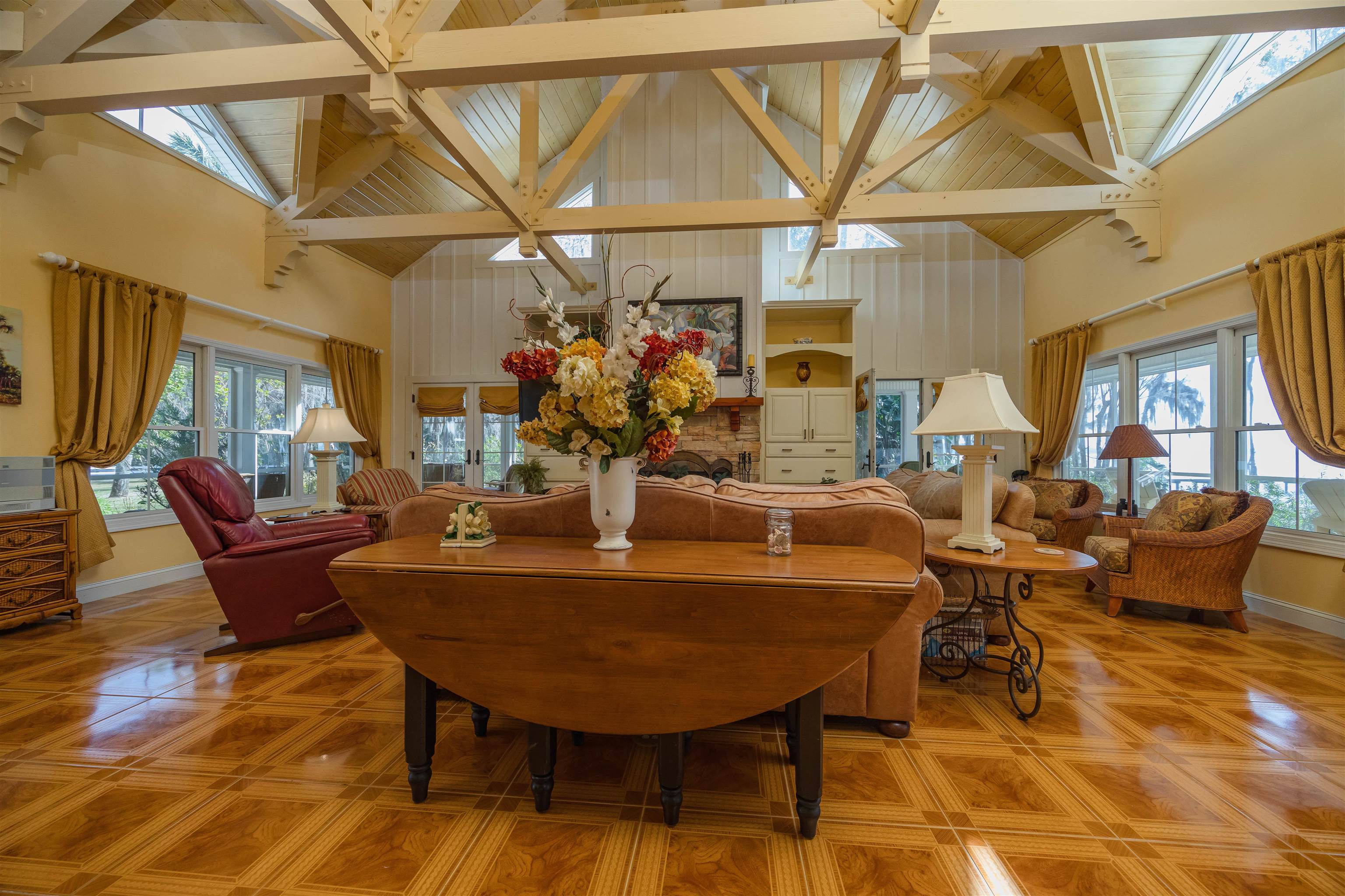 141 Wooten Rd Crescent Crescent City, FL 32112 - Photo 48 of 72 a view of a dining room with furniture and a chandelier
