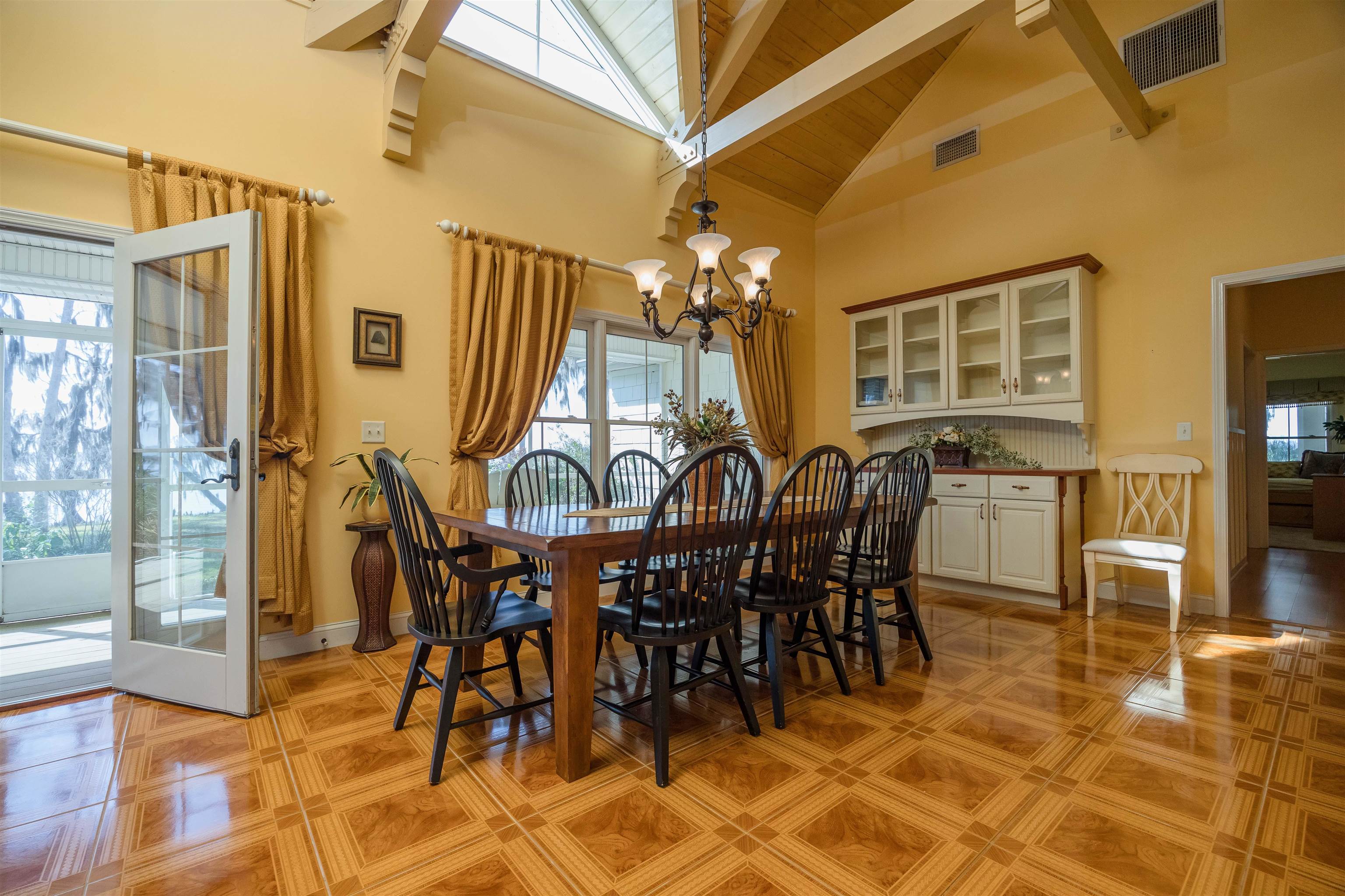 141 Wooten Rd Crescent Crescent City, FL 32112 - Photo 49 of 72 a view of a dining room with furniture and chandelier
