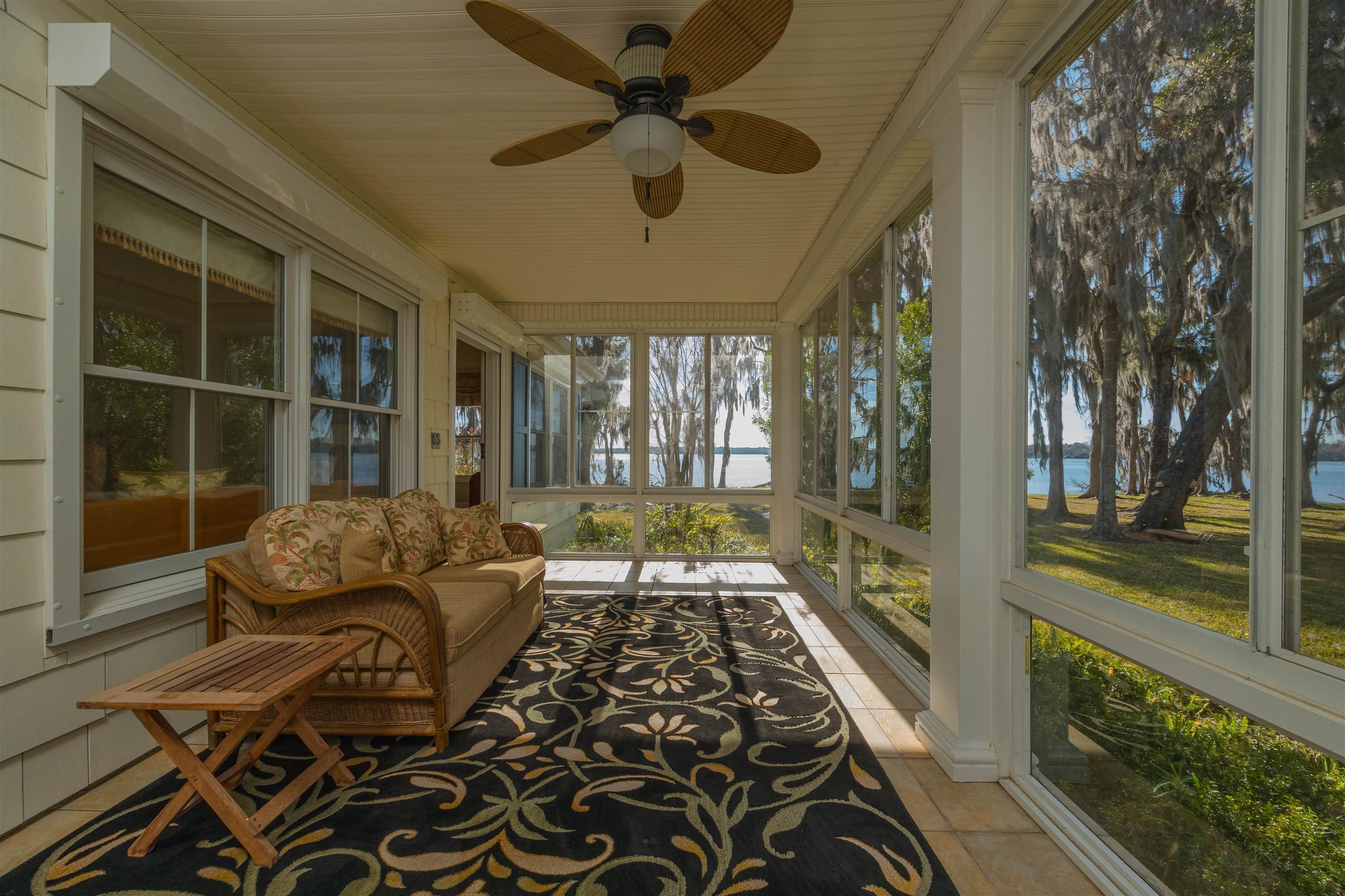 141 Wooten Rd Crescent Crescent City, FL 32112 - Photo 58 of 72 a bedroom with furniture and a large window