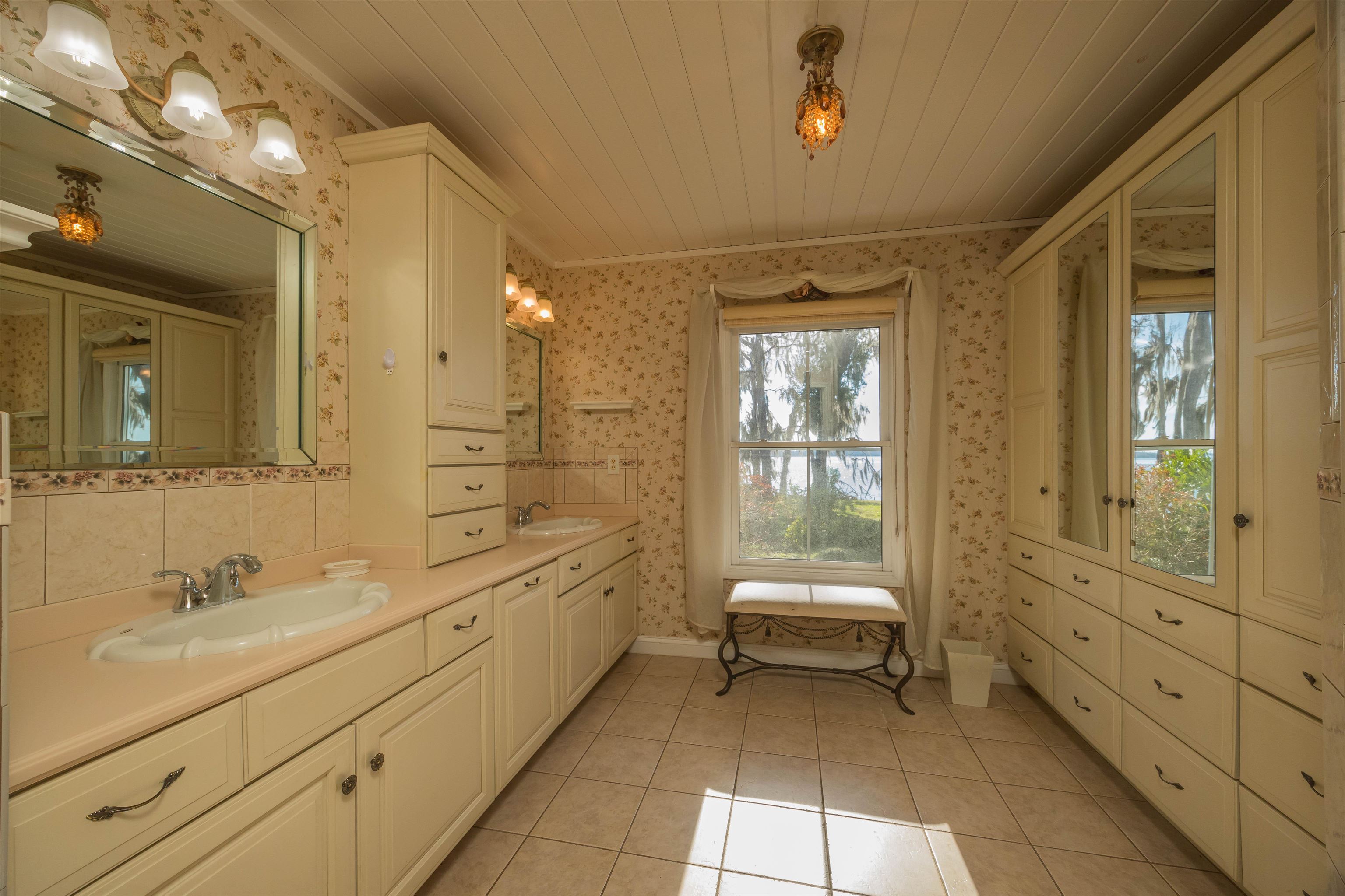 141 Wooten Rd Crescent Crescent City, FL 32112 - Photo 59 of 72 a bathroom with a sink a toilet and shower