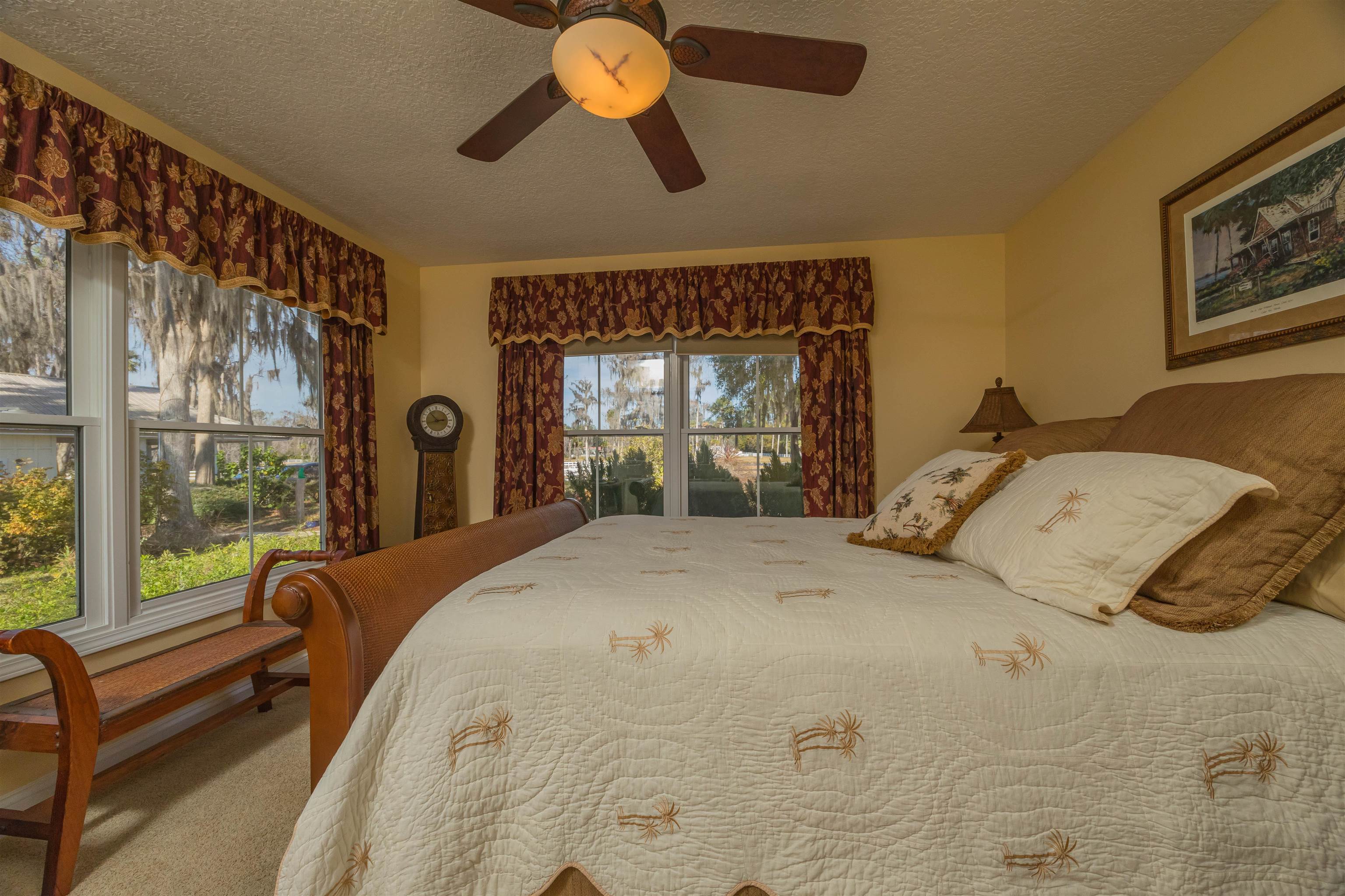 141 Wooten Rd Crescent Crescent City, FL 32112 - Photo 61 of 72 a bedroom with a bed and window