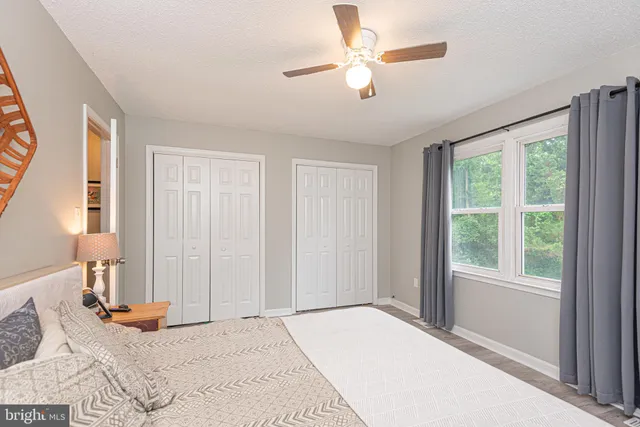a view of a bedroom from a hallway