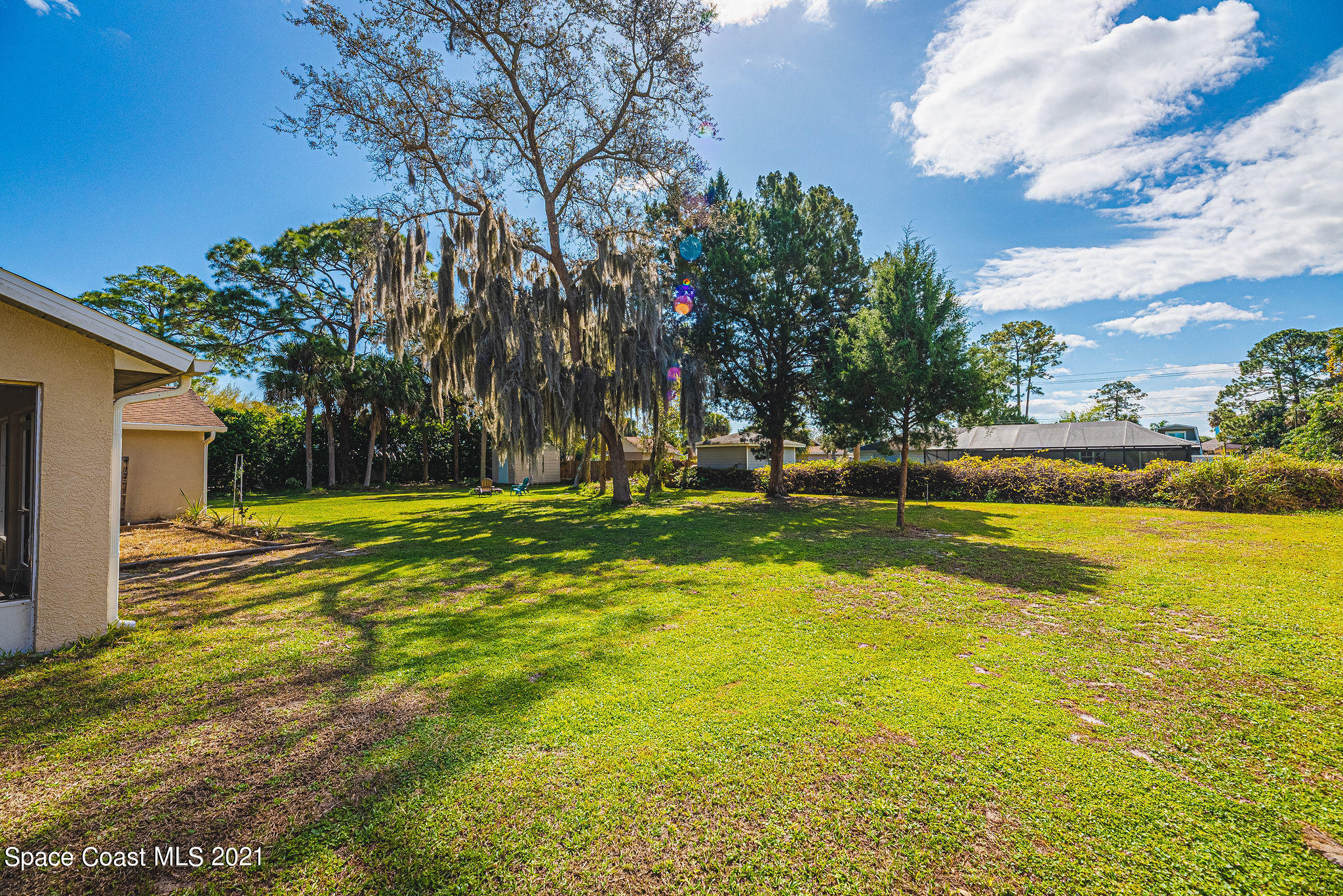 7207 Achilles Road Cocoa, FL 32927 - Photo 45 of 57 a view of swimming pool is middle in the garden