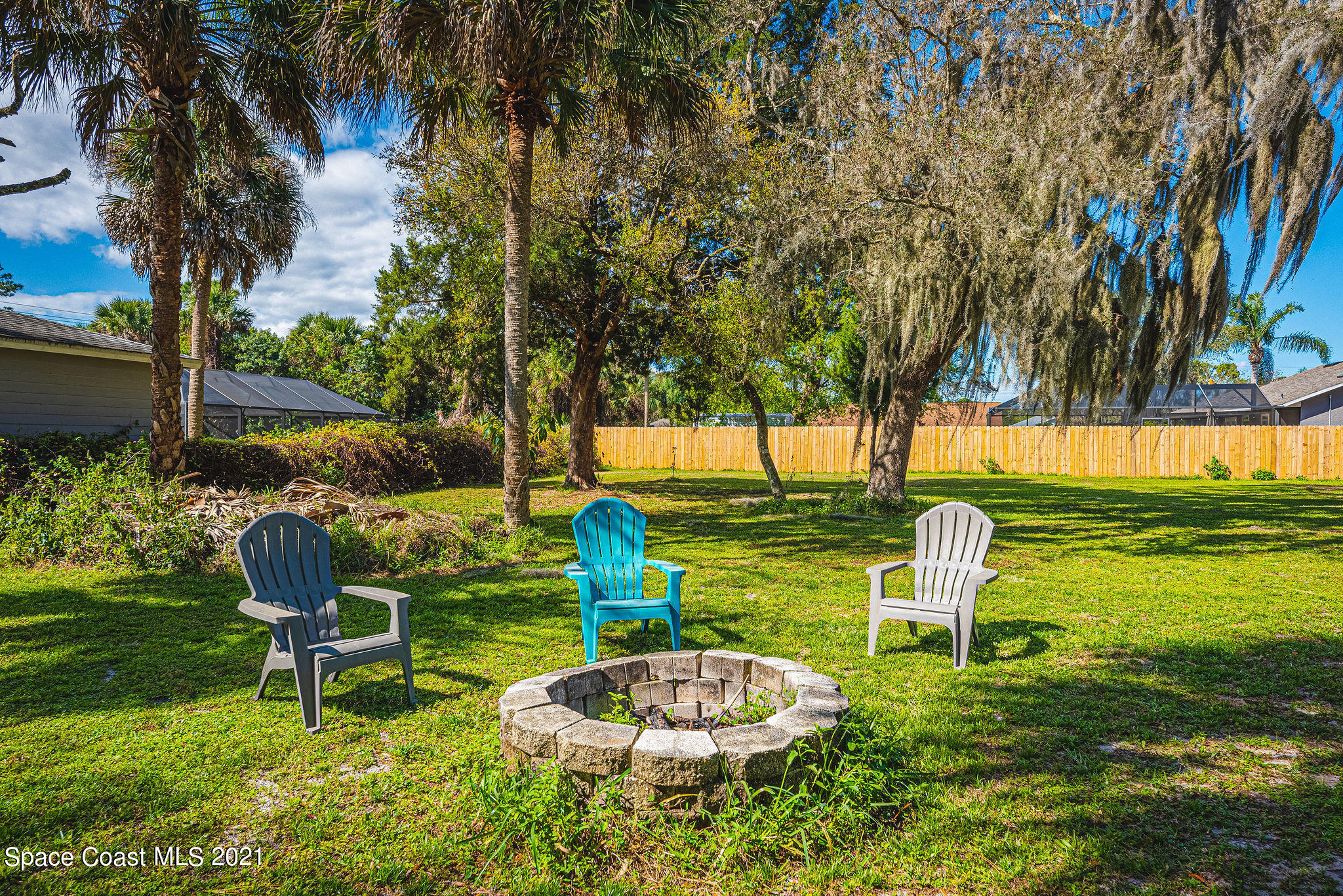 7207 Achilles Road Cocoa, FL 32927 - Photo 48 of 57 a swimming pool with barbeque oven and outdoor seating