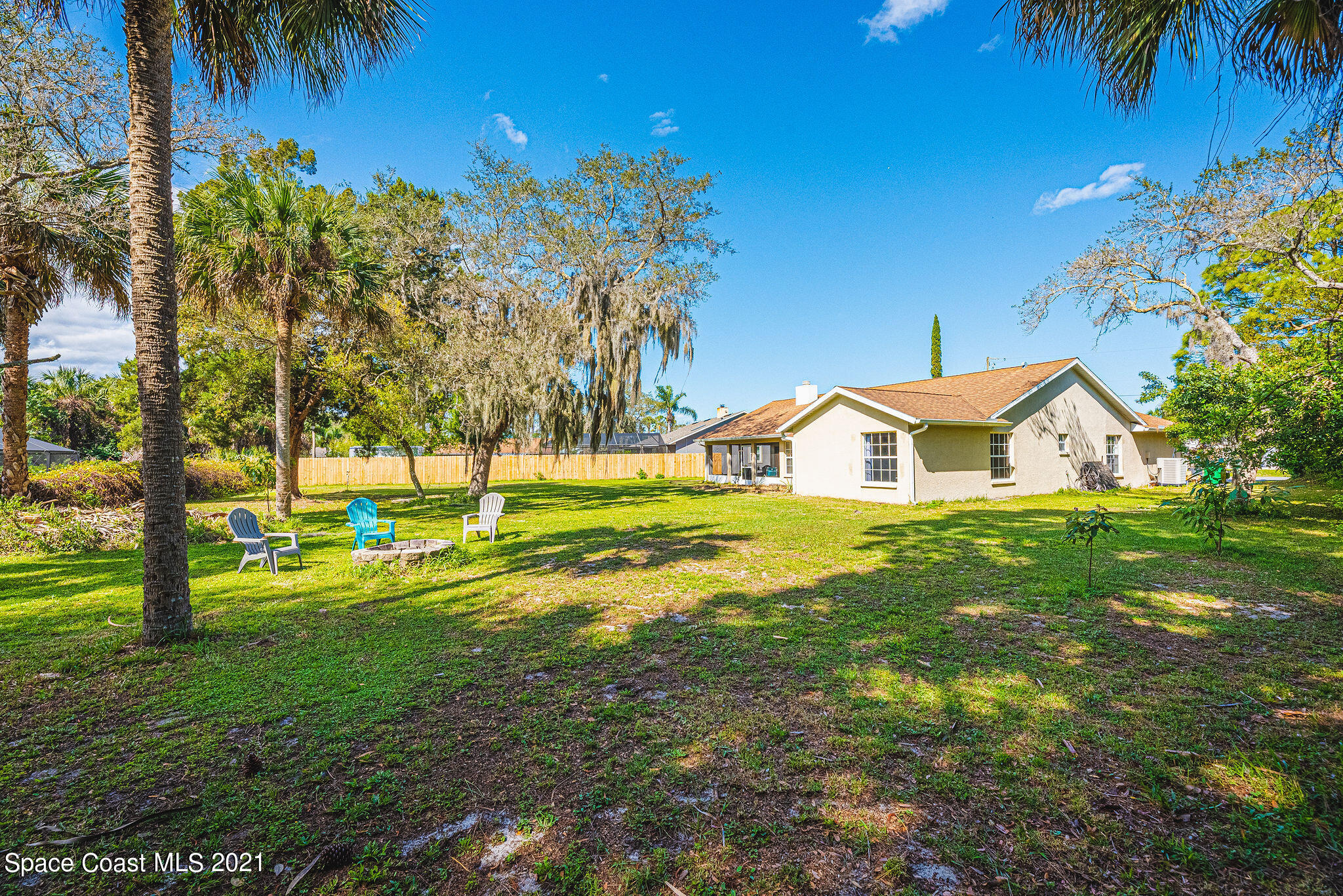 7207 Achilles Road Cocoa, FL 32927 - Photo 49 of 57 a front view of a house with a yard