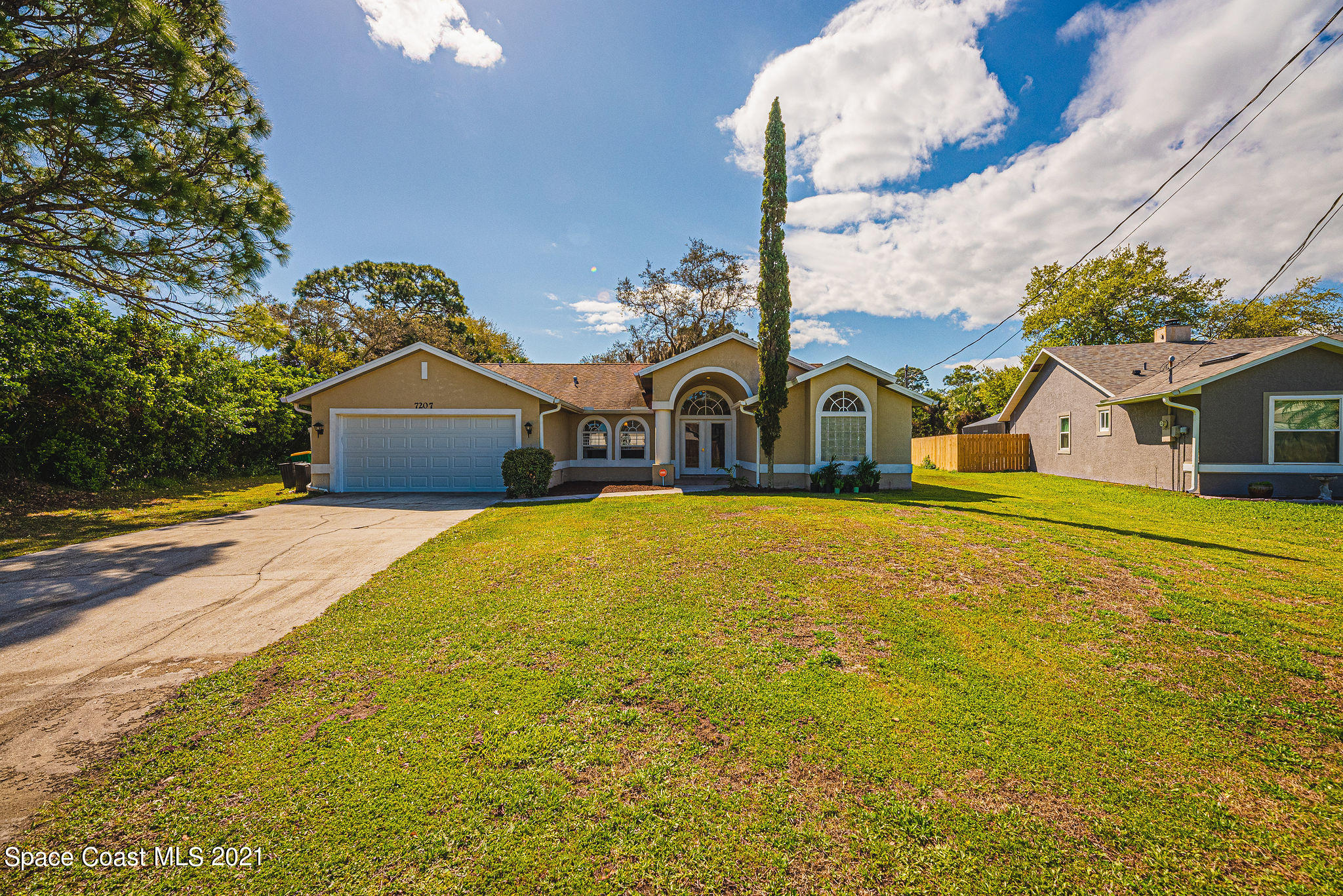 7207 Achilles Road Cocoa, FL 32927 - Photo 54 of 57 a house view with a swimming pool