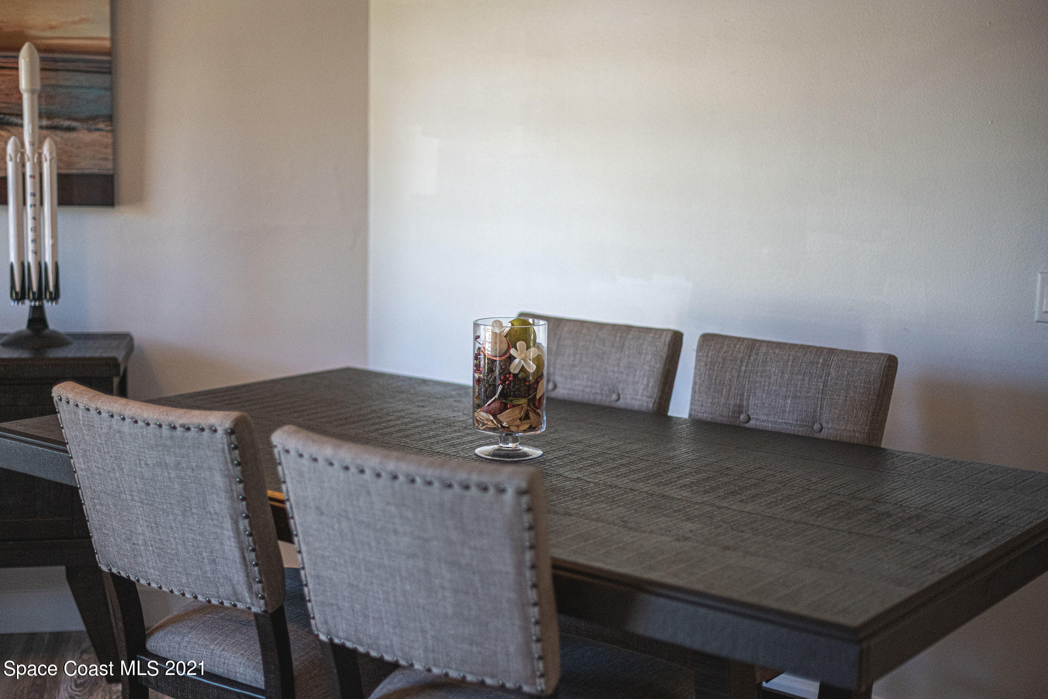 7207 Achilles Road Cocoa, FL 32927 - Photo 7 of 57 a view of table and chair