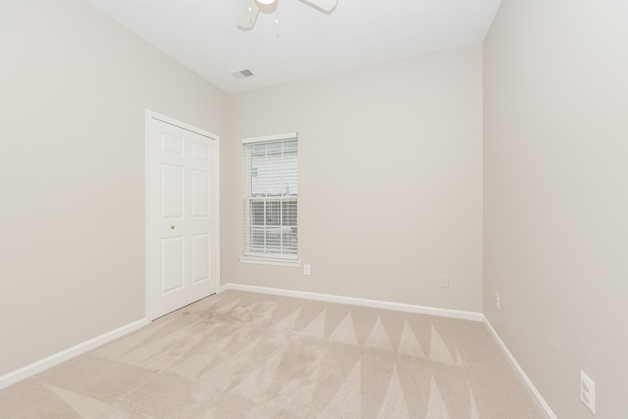 1006 Prince Street Spring Hill, TN 37174 - Photo 16 of 27 a view of an empty room with a window