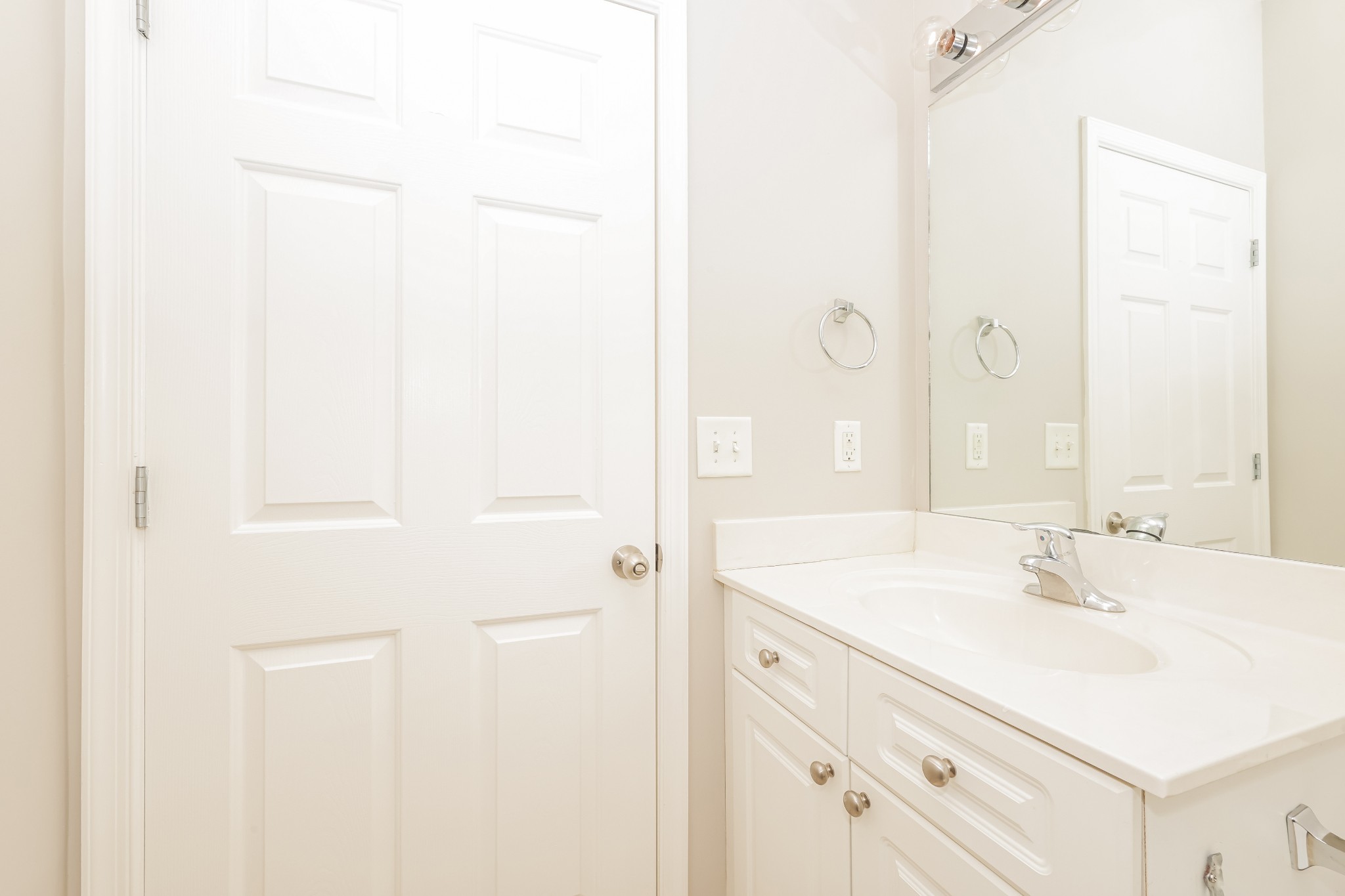 1006 Prince Street Spring Hill, TN 37174 - Photo 22 of 27 a bathroom with a sink and a mirror