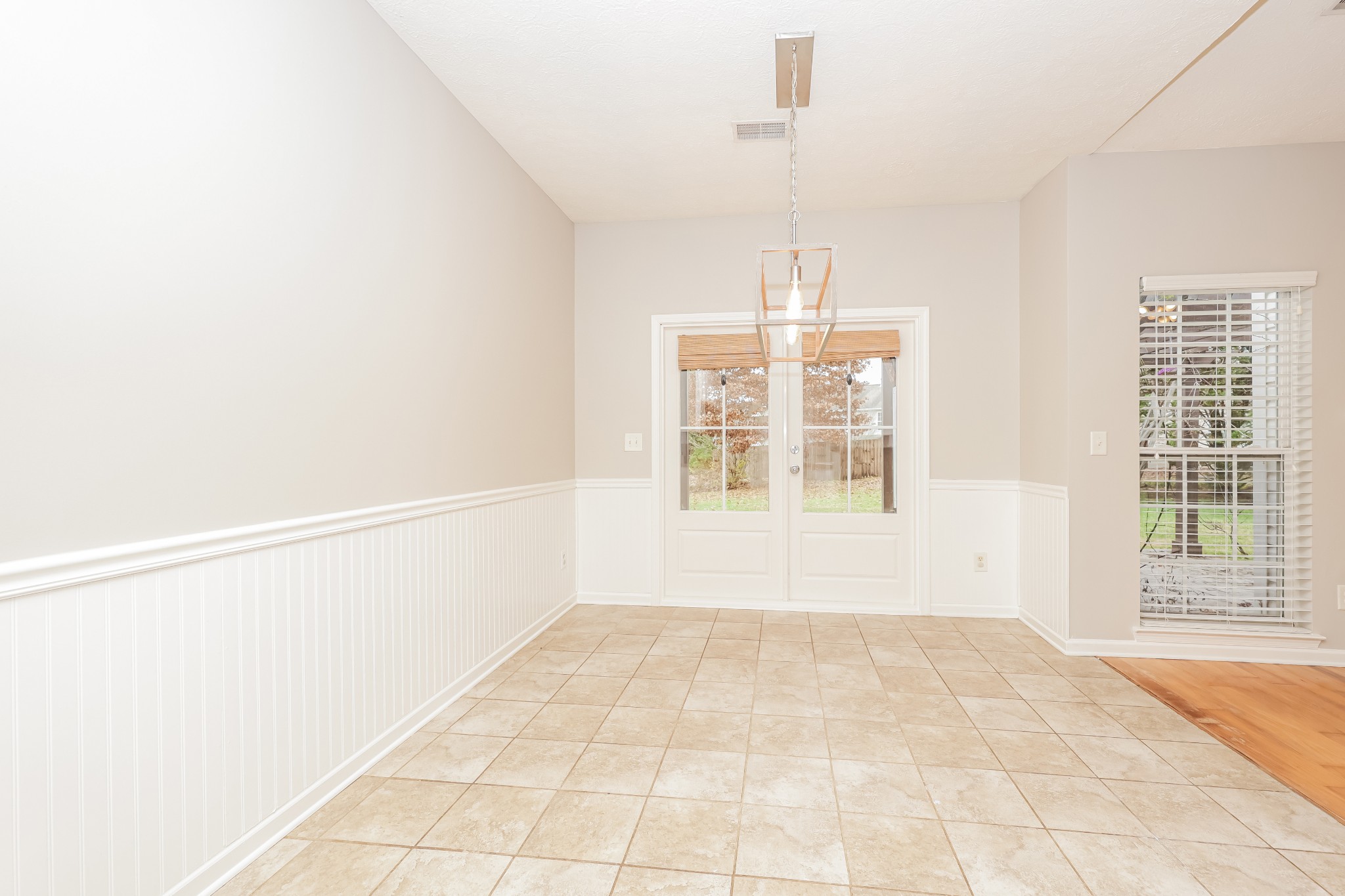 1006 Prince Street Spring Hill, TN 37174 - Photo 6 of 27 a view of an empty room with a window