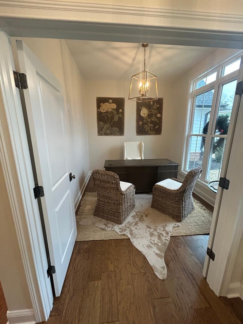 3755 McFall Road Palmyra, TN 37142 - Photo 15 of 18 a living room with couches and a table with wooden floor