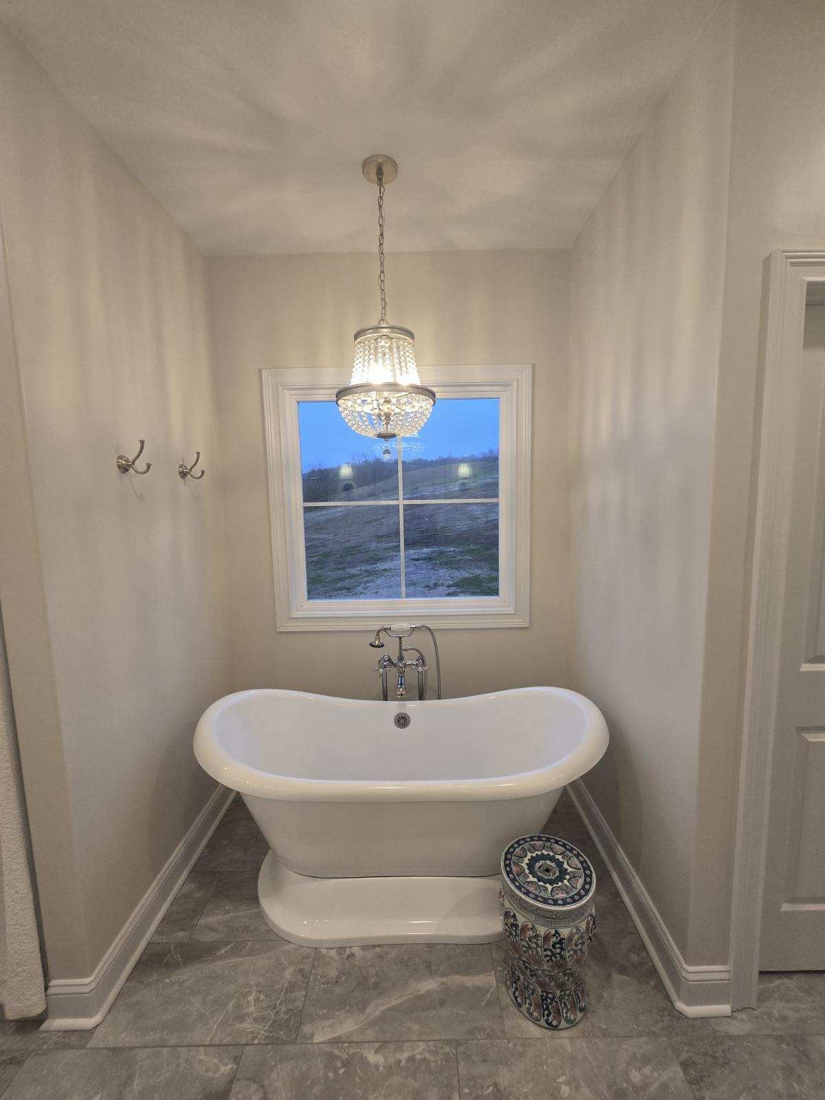 3755 McFall Road Palmyra, TN 37142 - Photo 16 of 18 a bathroom with a sink and a window