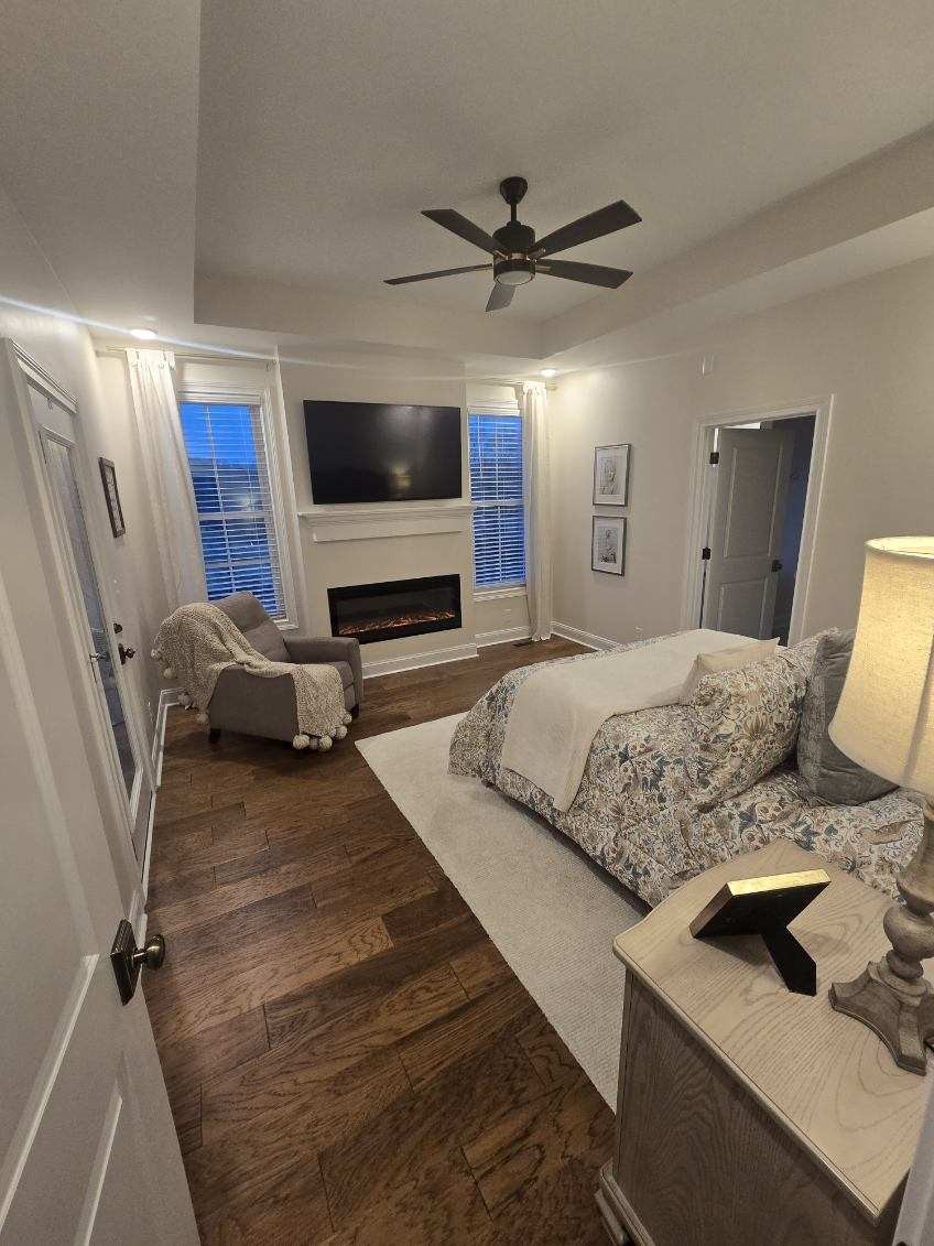 3755 McFall Road Palmyra, TN 37142 - Photo 5 of 18 a bedroom with a bed and flat screen tv