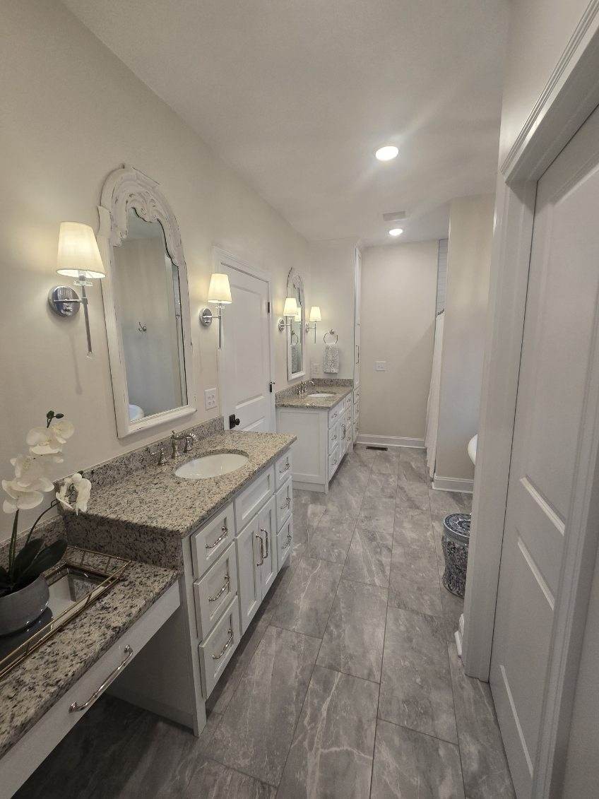 3755 McFall Road Palmyra, TN 37142 - Photo 8 of 18 a spacious bathroom with a granite countertop sink and a mirror