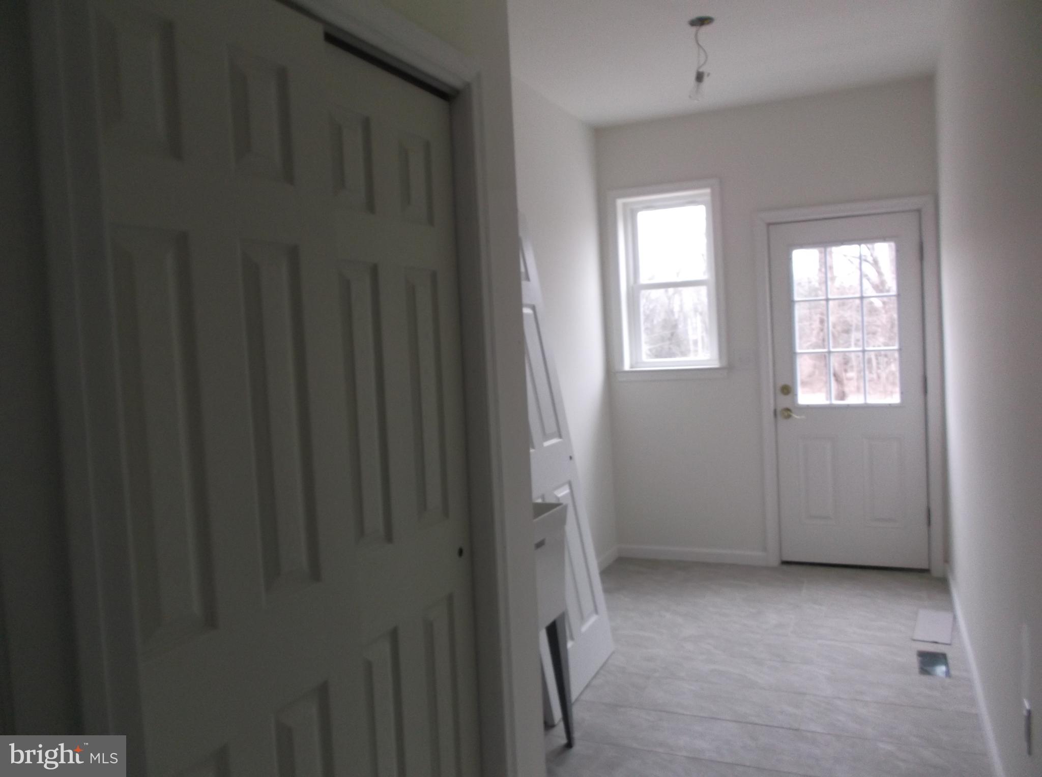 1215 North Ridge Road Perkasie, PA 18944 - Photo 21 of 34 Main level Laundry Room with exit door