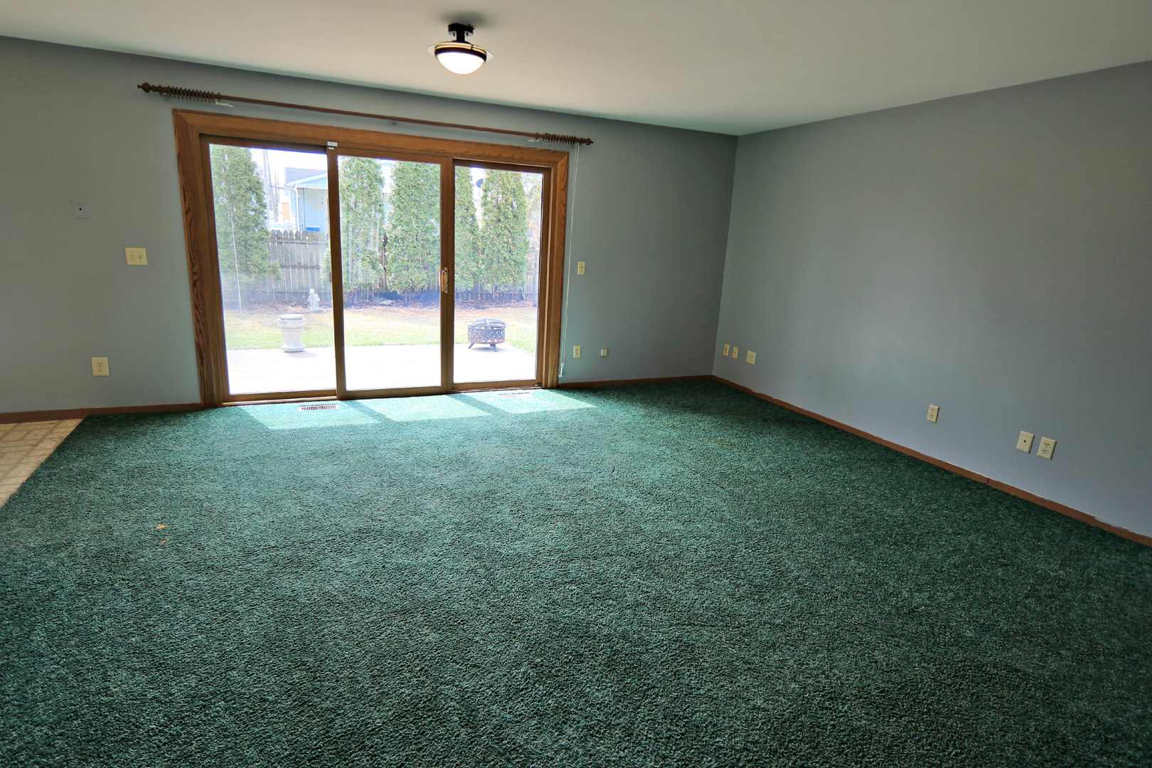 12005 Maple Avenue Hebron, IL 60034 - Photo 13 of 28 an empty room with large windows