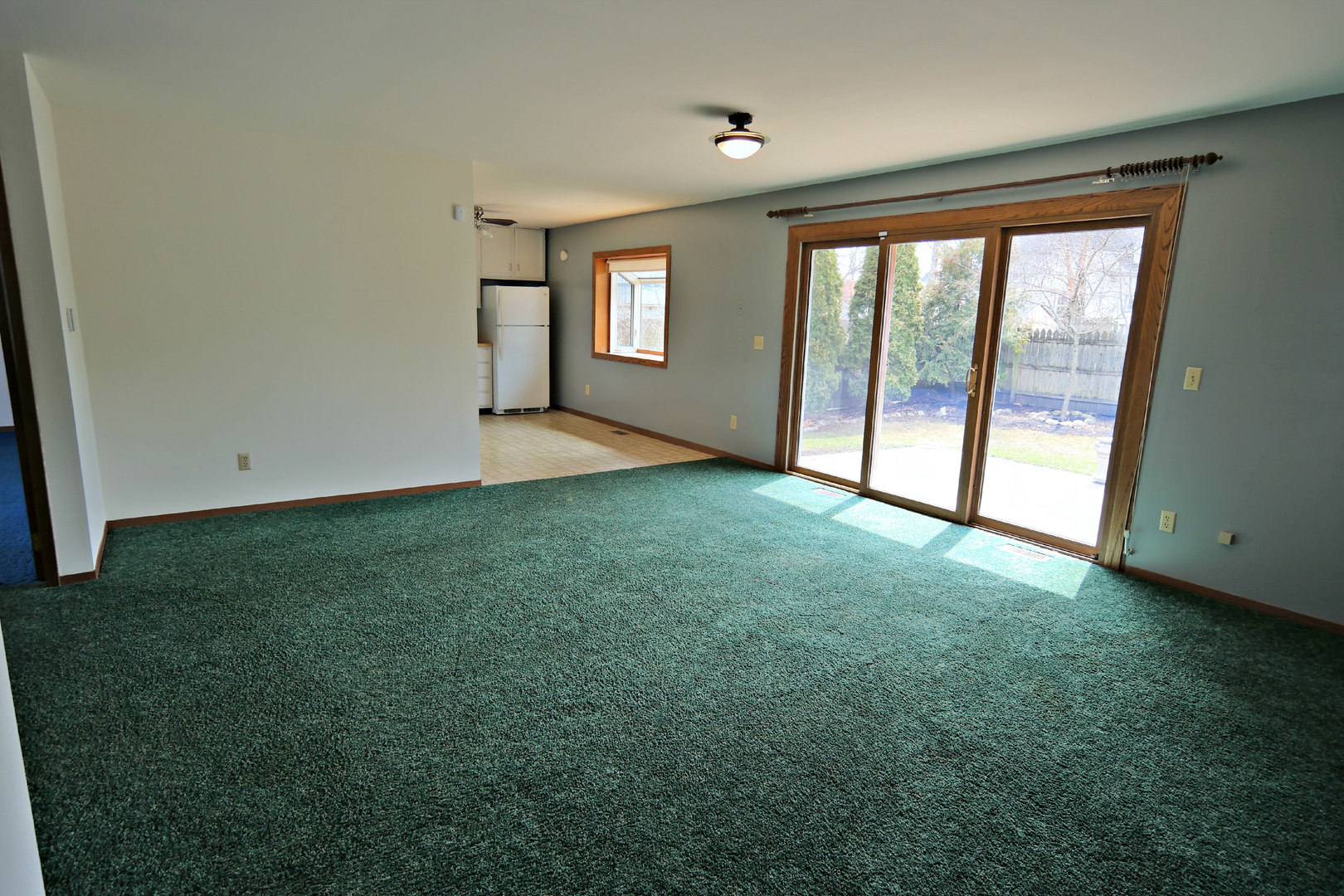 12005 Maple Avenue Hebron, IL 60034 - Photo 14 of 28 a view of an empty room with a window