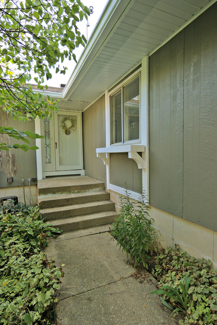 12005 Maple Avenue Hebron, IL 60034 - Photo 25 of 28 a view of a house with a garden
