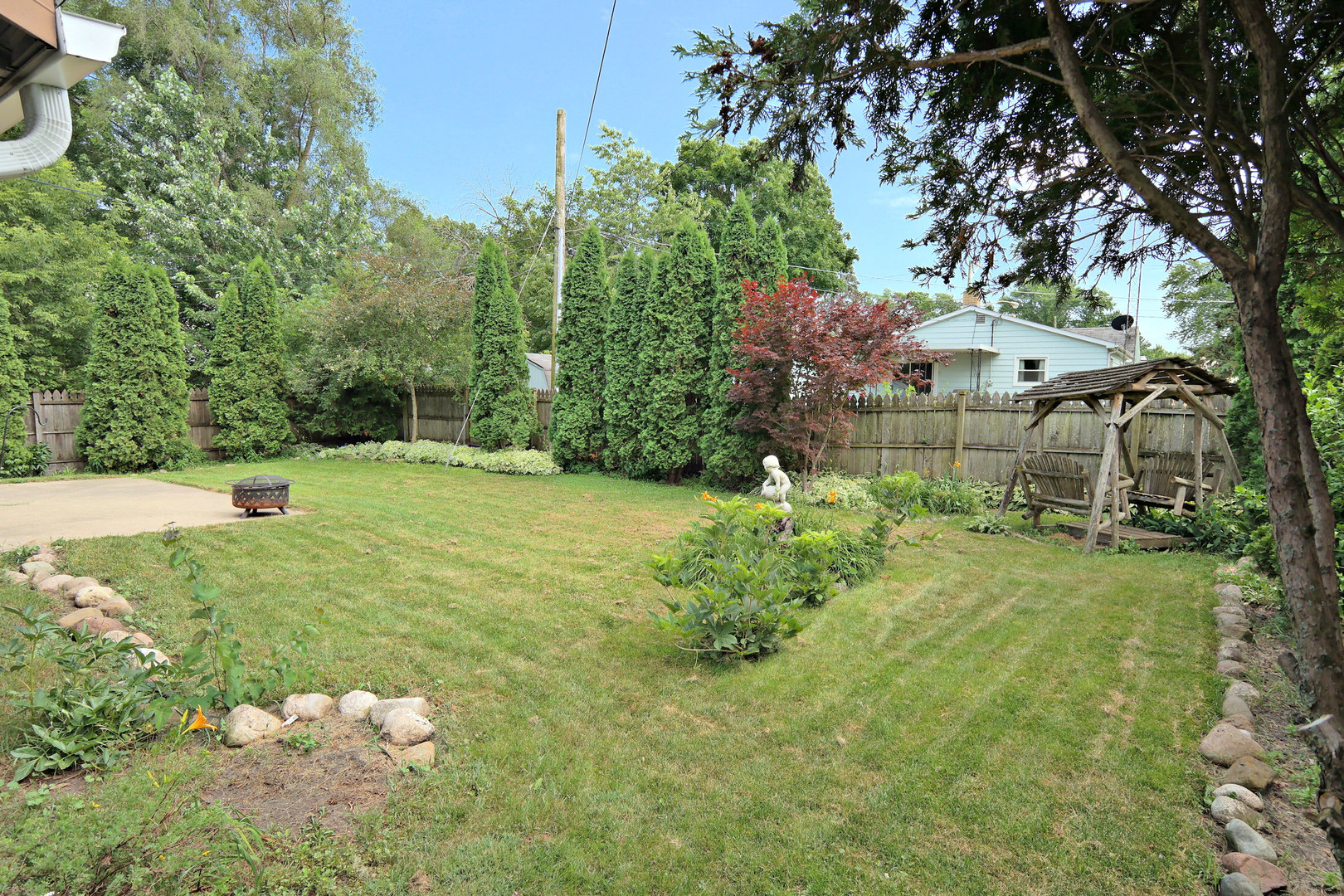12005 Maple Avenue Hebron, IL 60034 - Photo 4 of 28 a view of a garden with a tree
