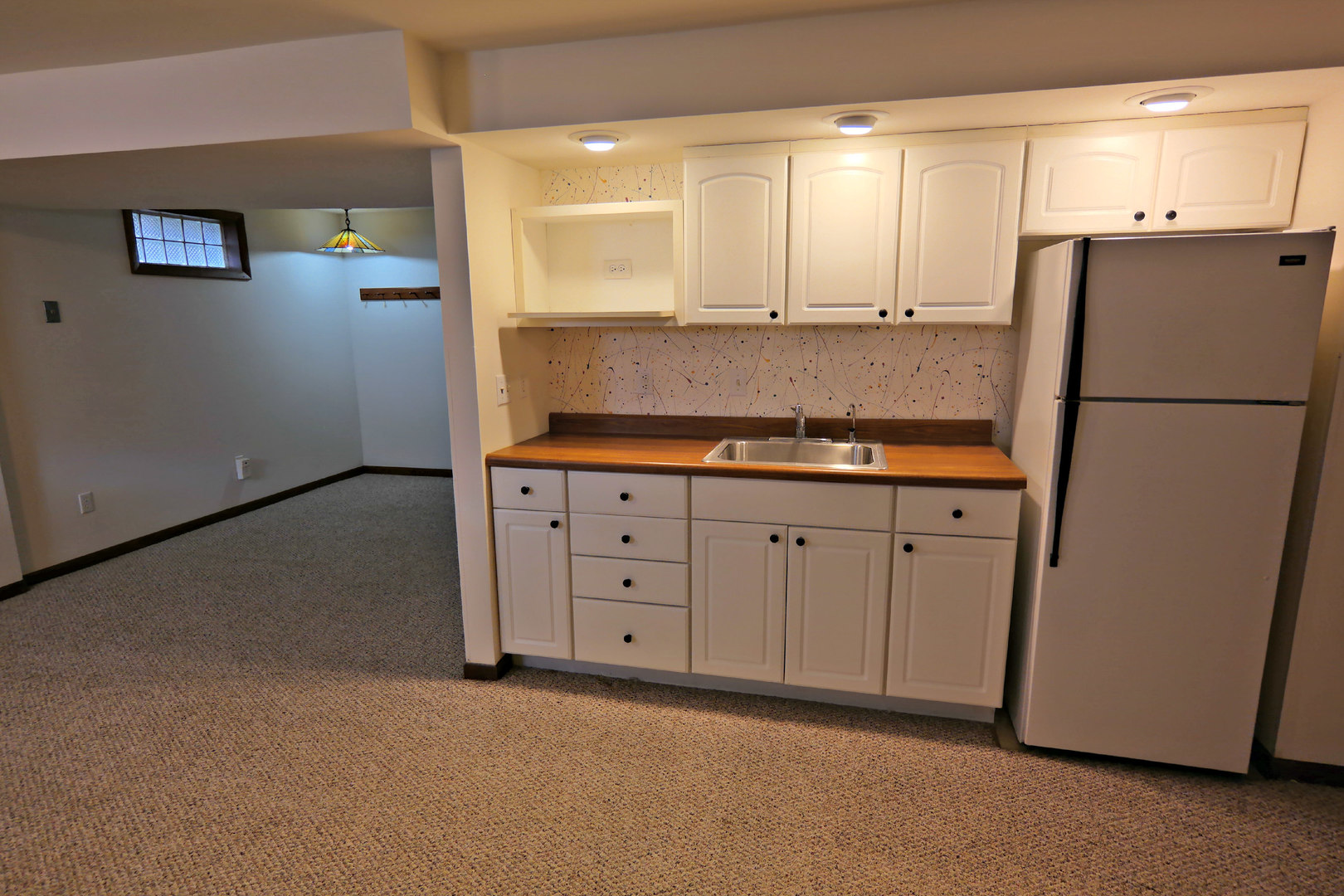 12005 Maple Avenue Hebron, IL 60034 - Photo 9 of 28 a kitchen with granite countertop cabinets and refrigerator