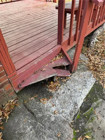 a kitchen with a sink and a refrigerator