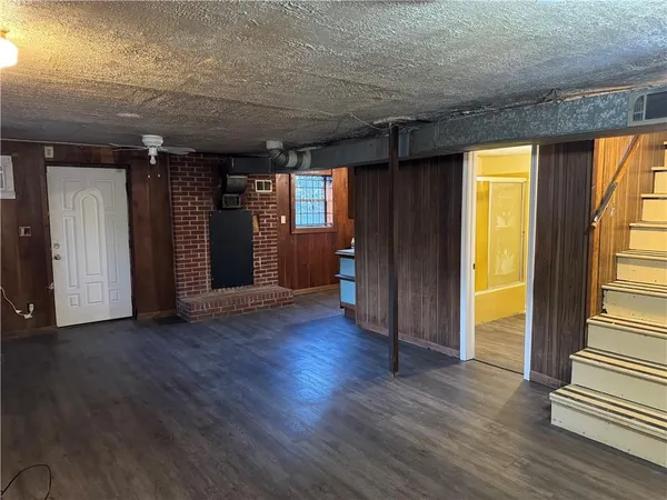 a utility room with sink dryer and washer