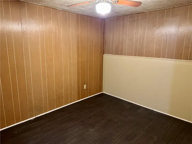 a view of a livingroom with wooden floor