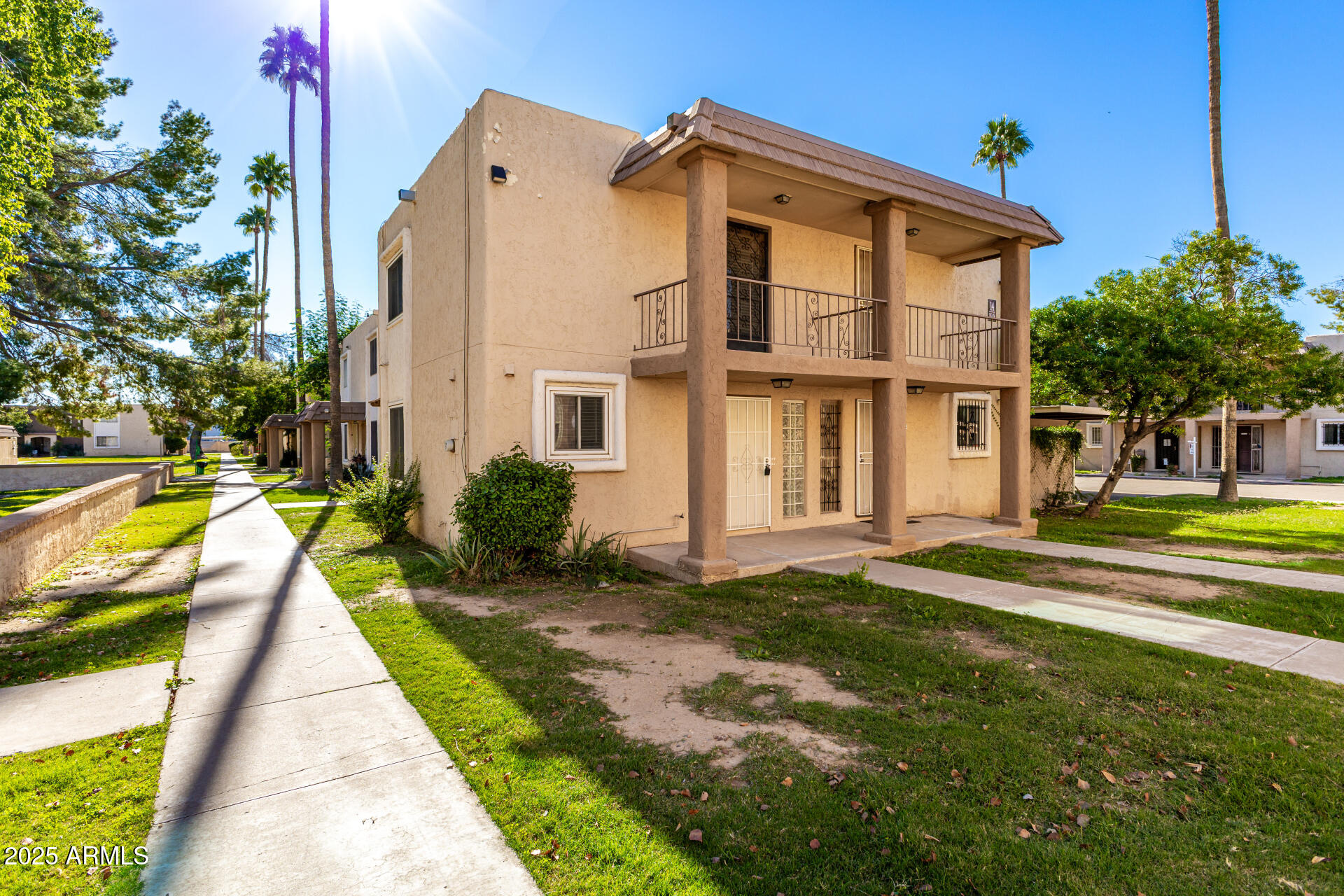 7126 North 19th Avenue, Unit 224 Phoenix, AZ 85021 - Photo 2 of 37 a view of a house with a swimming pool