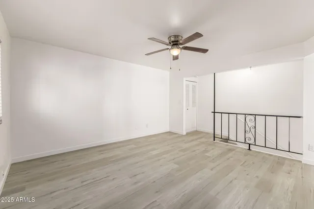 a bathroom with a shower and a toilet