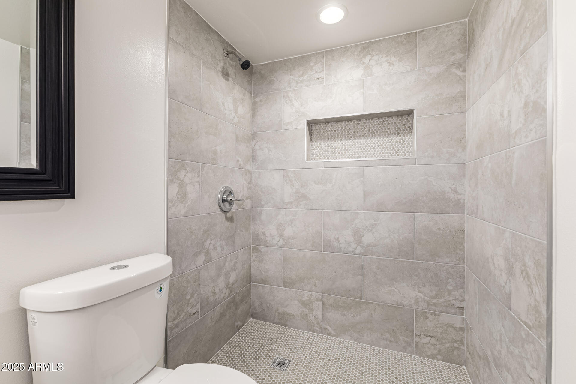 7126 North 19th Avenue, Unit 224 Phoenix, AZ 85021 - Photo 24 of 37 a bathroom with a shower and a toilet