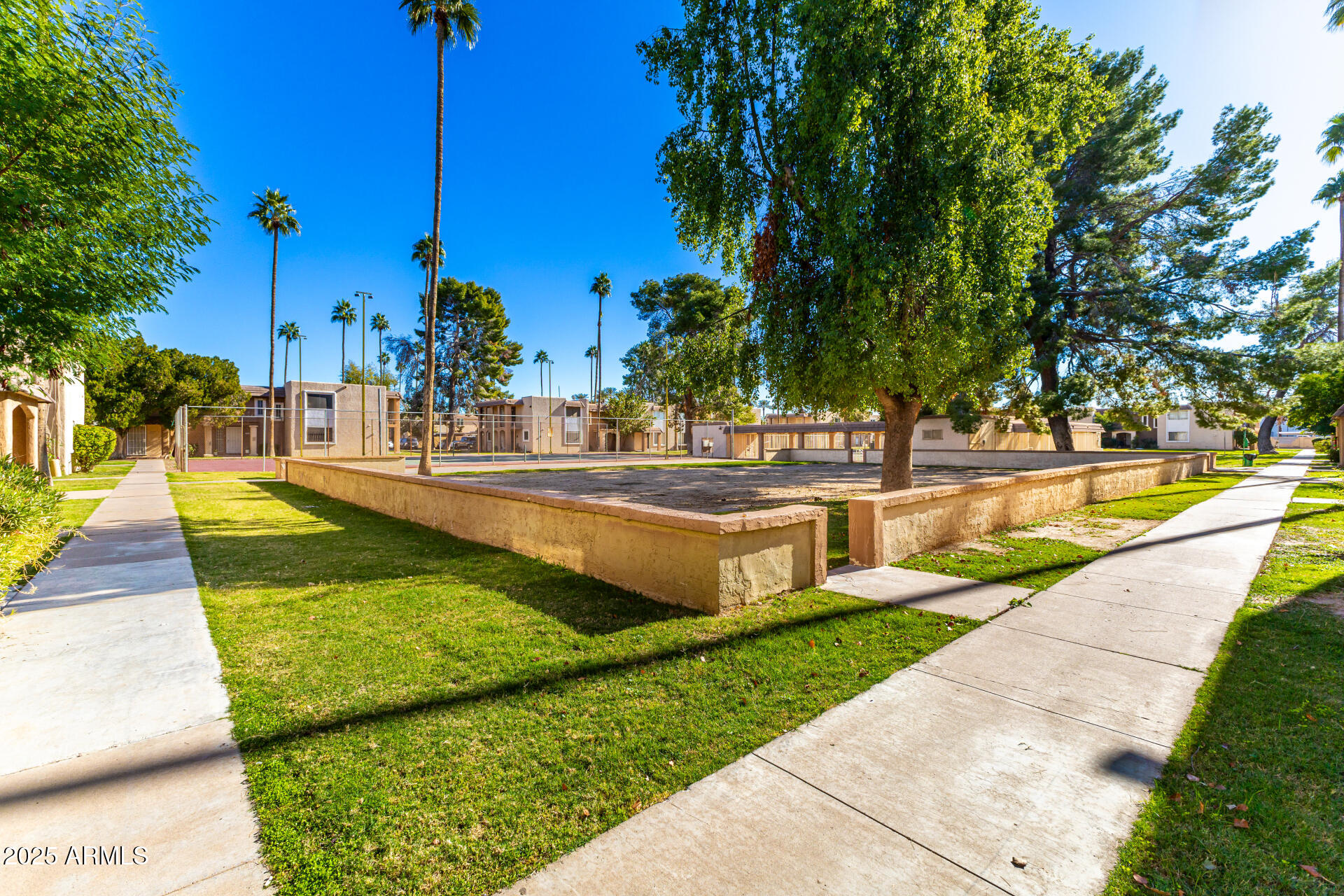 7126 North 19th Avenue, Unit 224 Phoenix, AZ 85021 - Photo 29 of 37 a view of a swimming pool with a patio