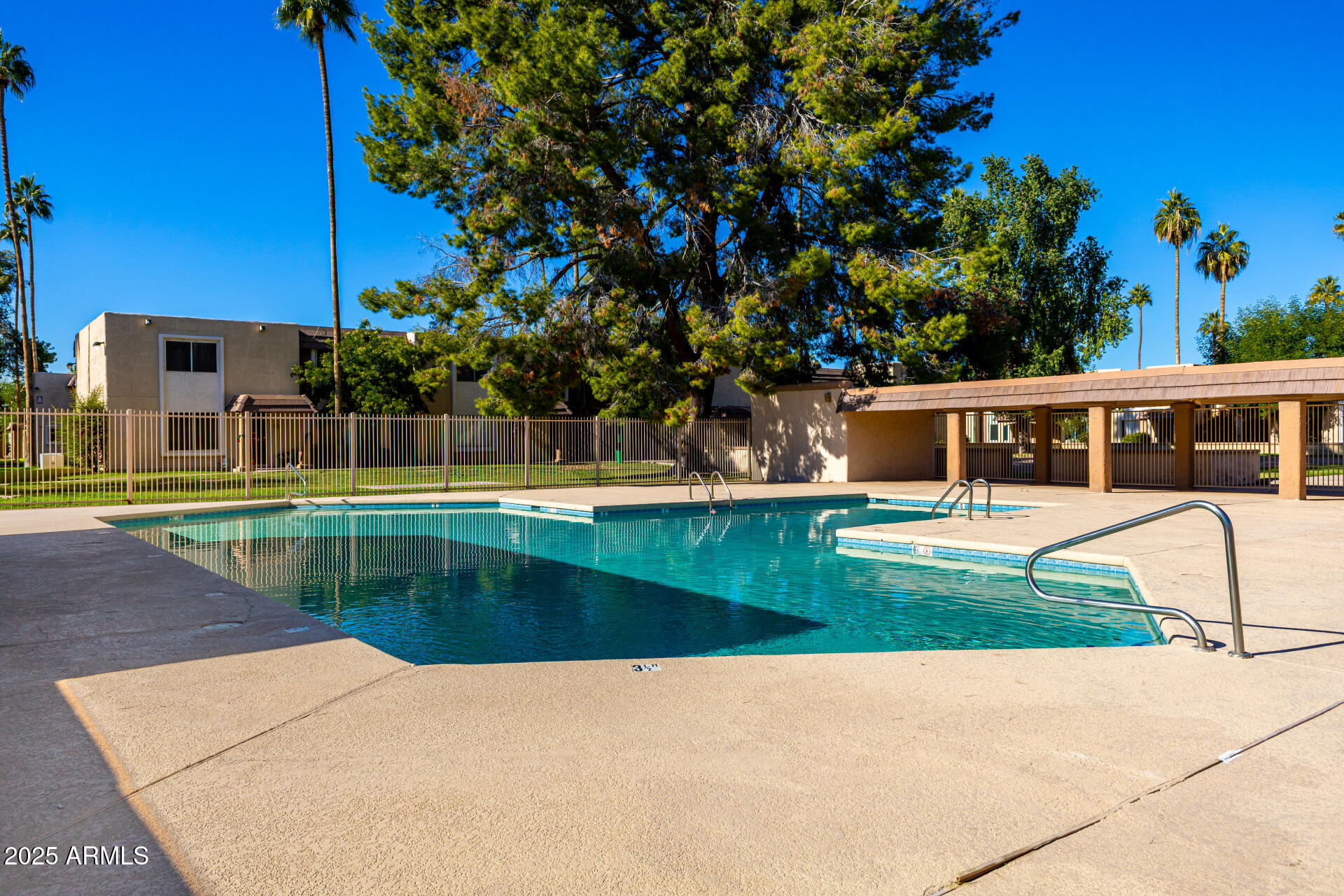 7126 North 19th Avenue, Unit 224 Phoenix, AZ 85021 - Photo 34 of 37 a view of a house with a swimming pool