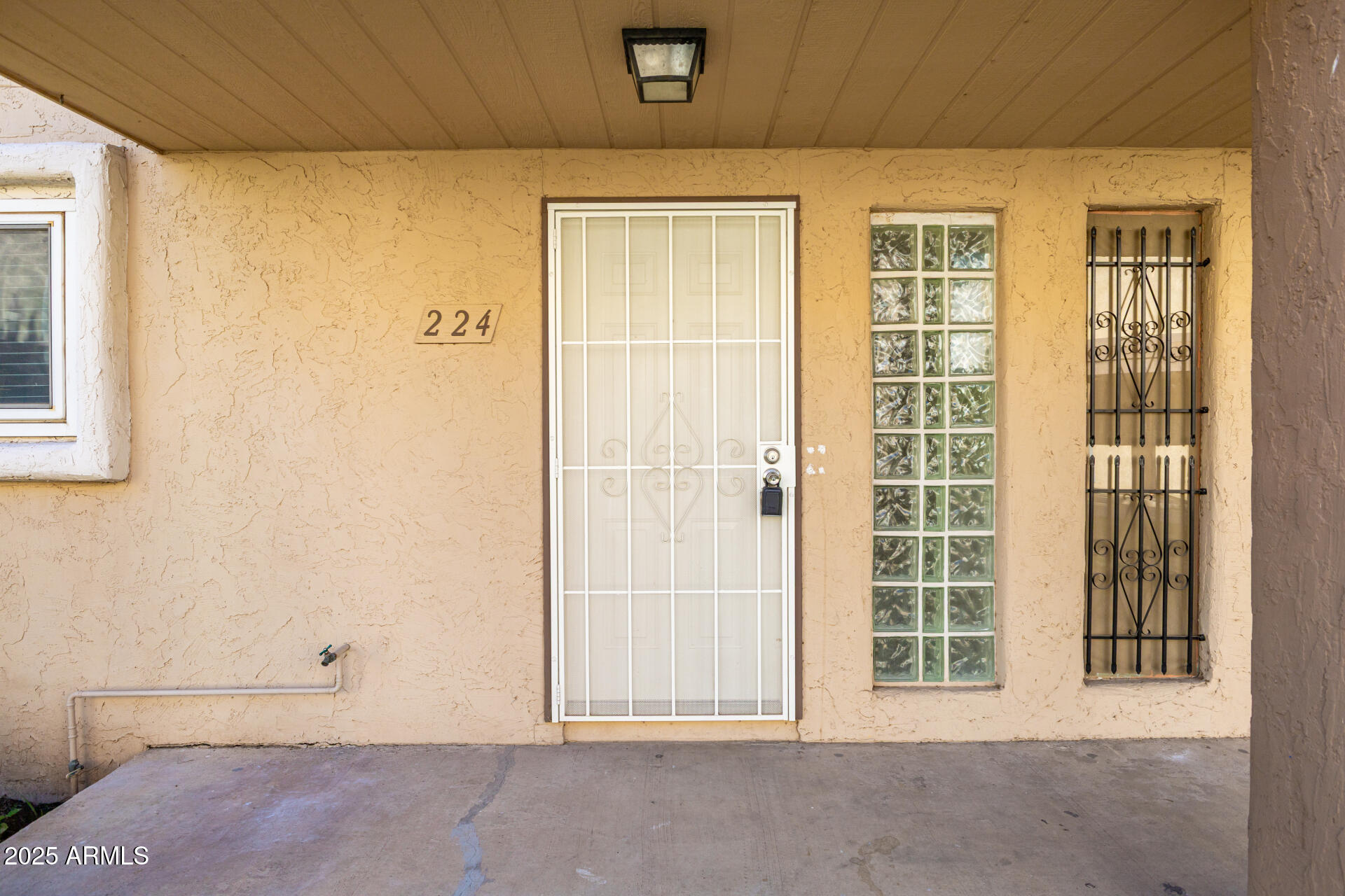 7126 North 19th Avenue, Unit 224 Phoenix, AZ 85021 - Photo 4 of 37 a view of an empty room with a window