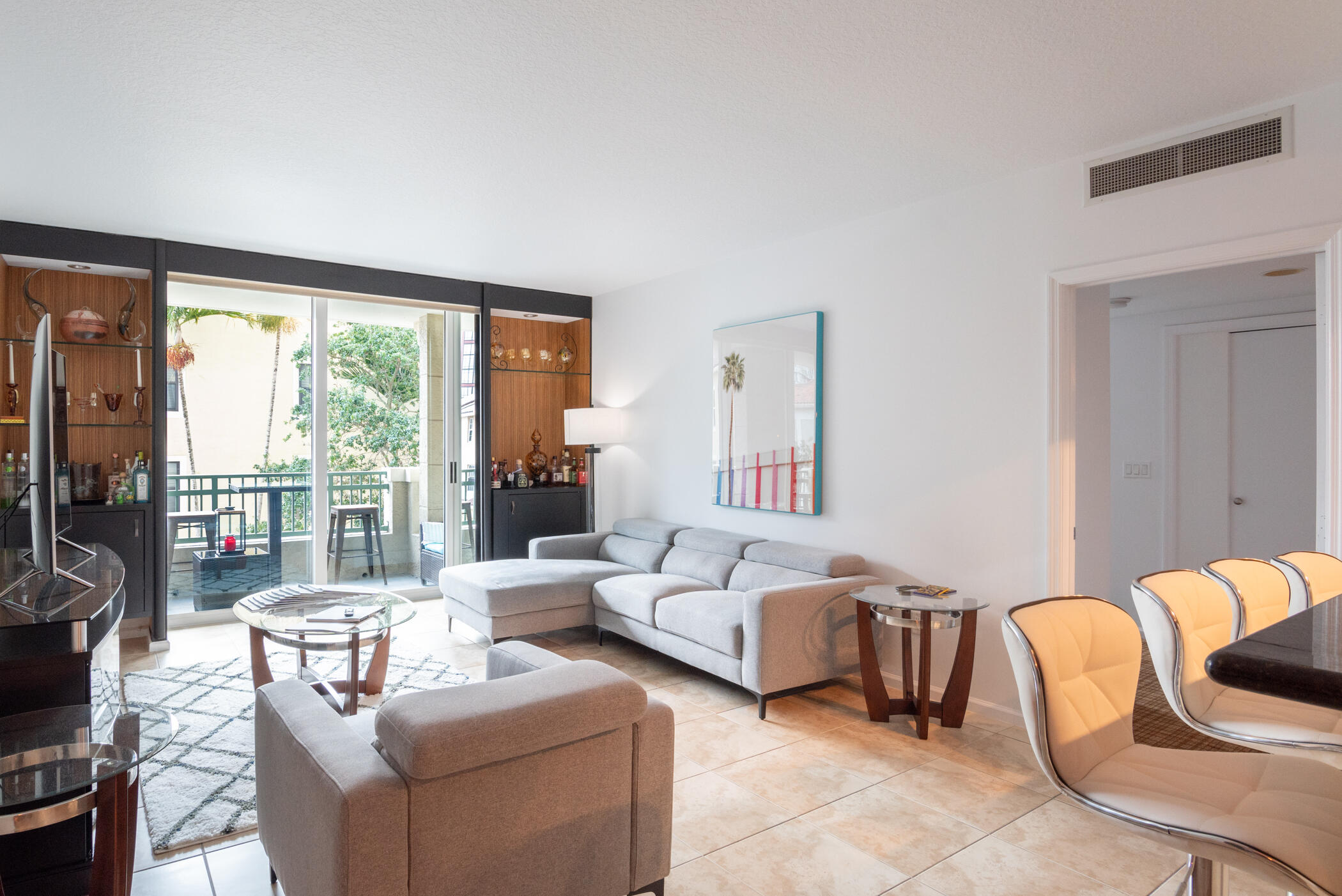 403 South Sapodilla Avenue, Unit 207 West Palm Beach, FL 33401 - Photo 6 of 32 a living room with furniture and a large window