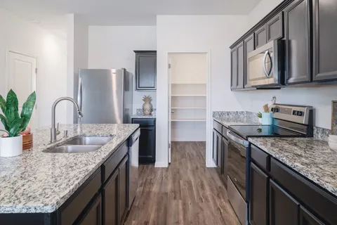 an empty room that has a window in it