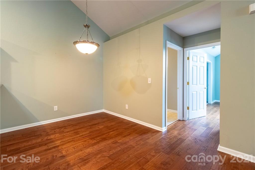 846 Ledgestone Court Tega Cay, SC 29708 - Photo 22 of 41 a view of empty room with wooden floor