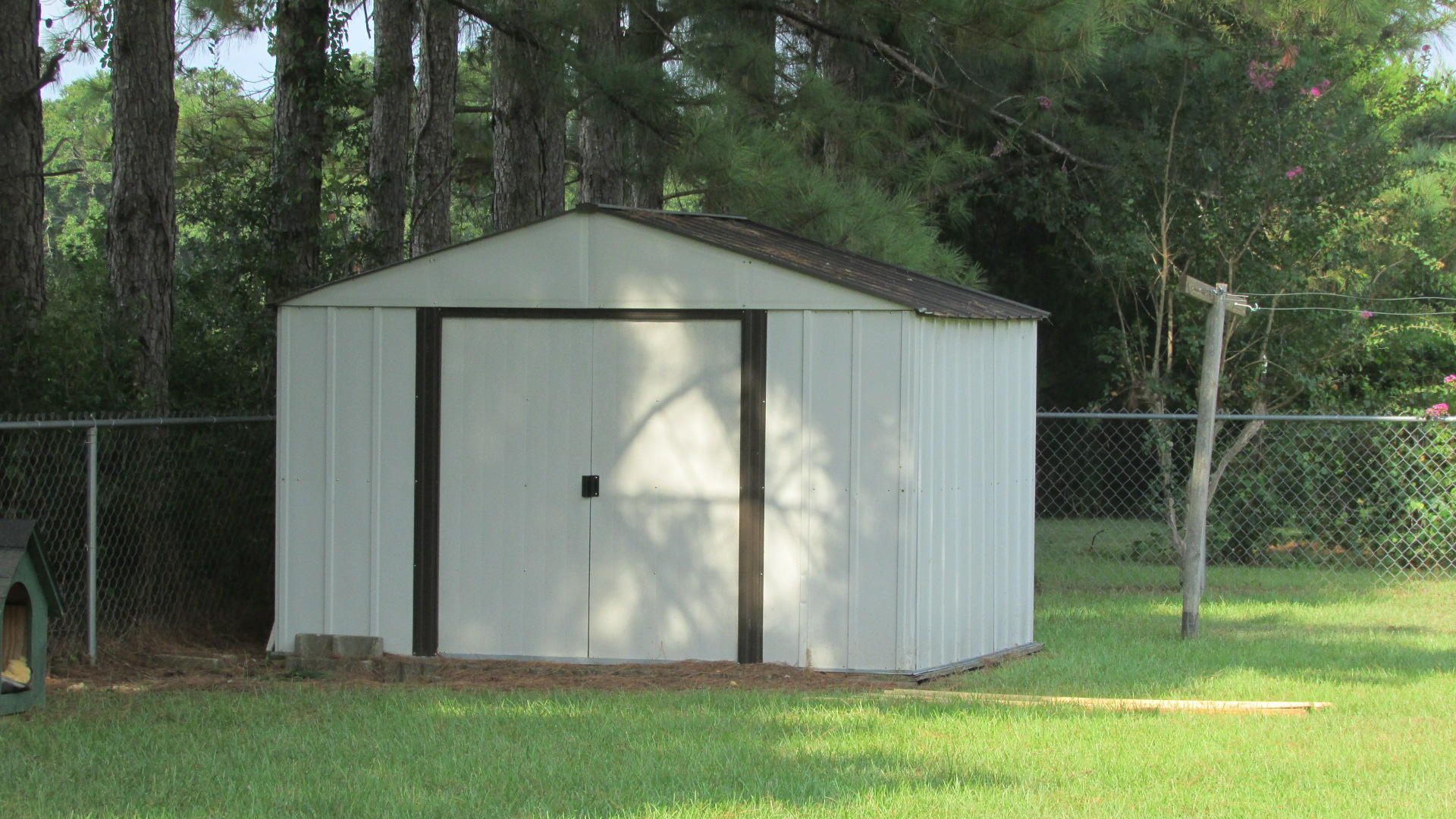 6121 Buckward Road Baker, FL 32531 - Photo 3 of 14 a backyard of a house with lots of green space